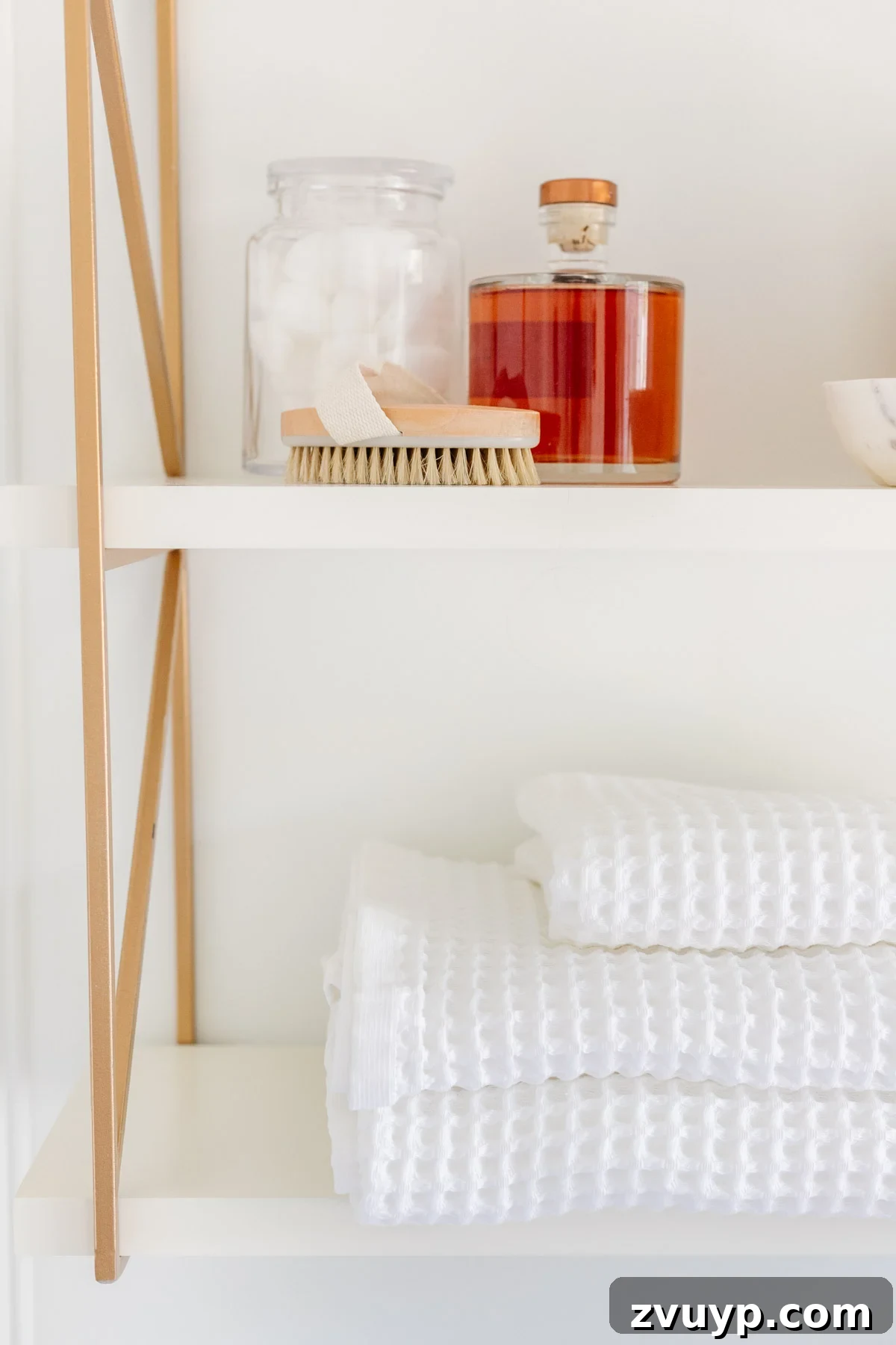 The Perfect Blend: Modern Vintage En Suite Bathroom Tour 30 Styled bathroom shelves with elegant decor and functional storage for small items, including apothecary jars and a decorative vase