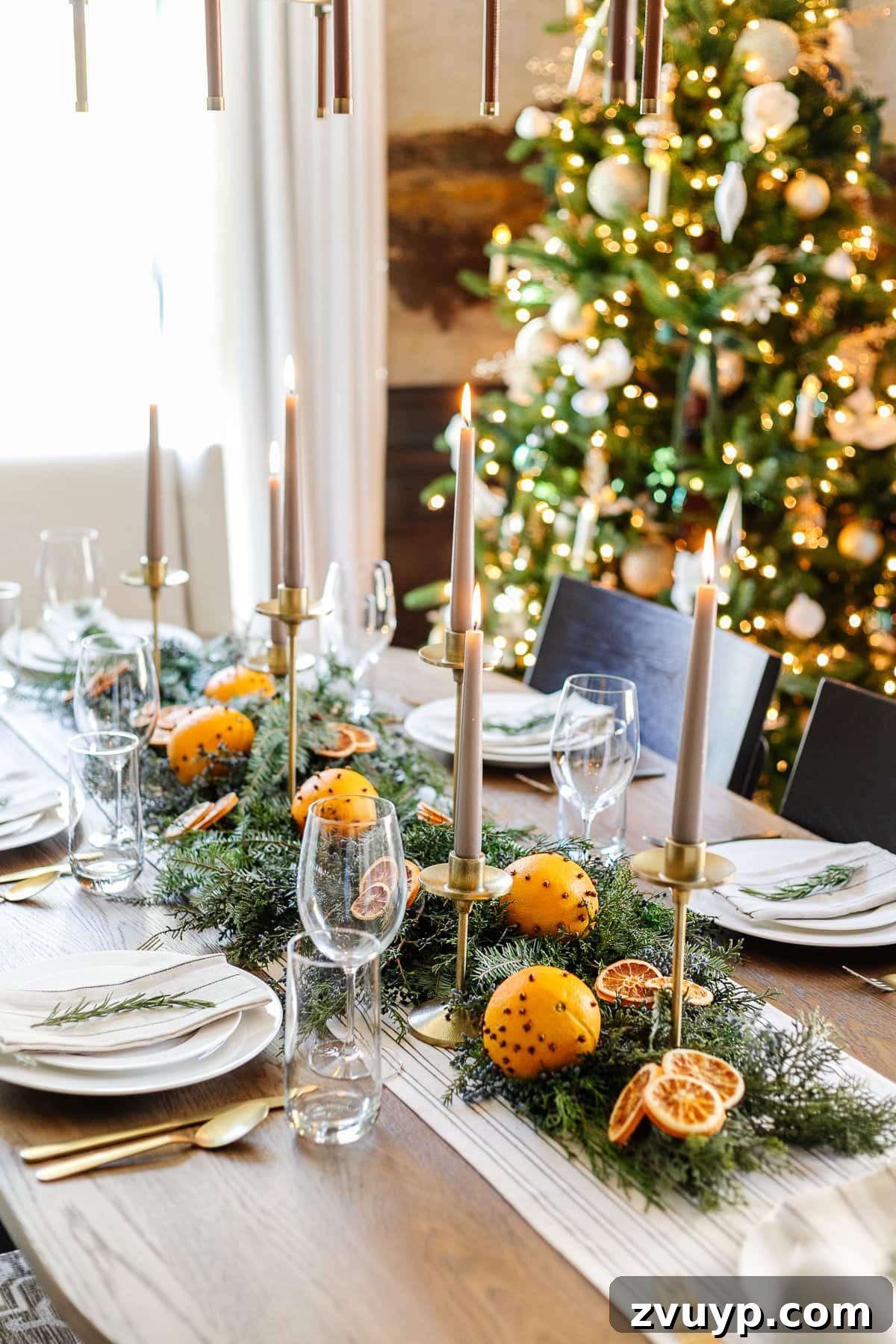 2021 Holiday Home Tour Classic Christmas Decor 11 simple Christmas centerpiece using orange pomanders and evergreen branches