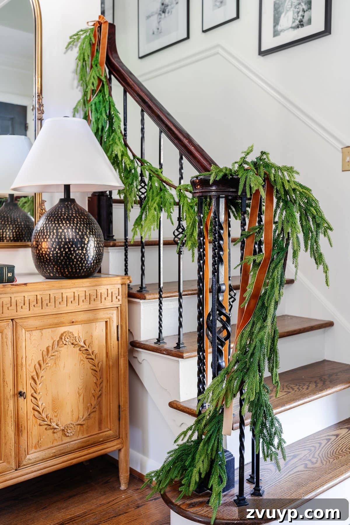 2021 Holiday Home Tour Classic Christmas Decor 6 realistic garland on stairs for Christmas decor