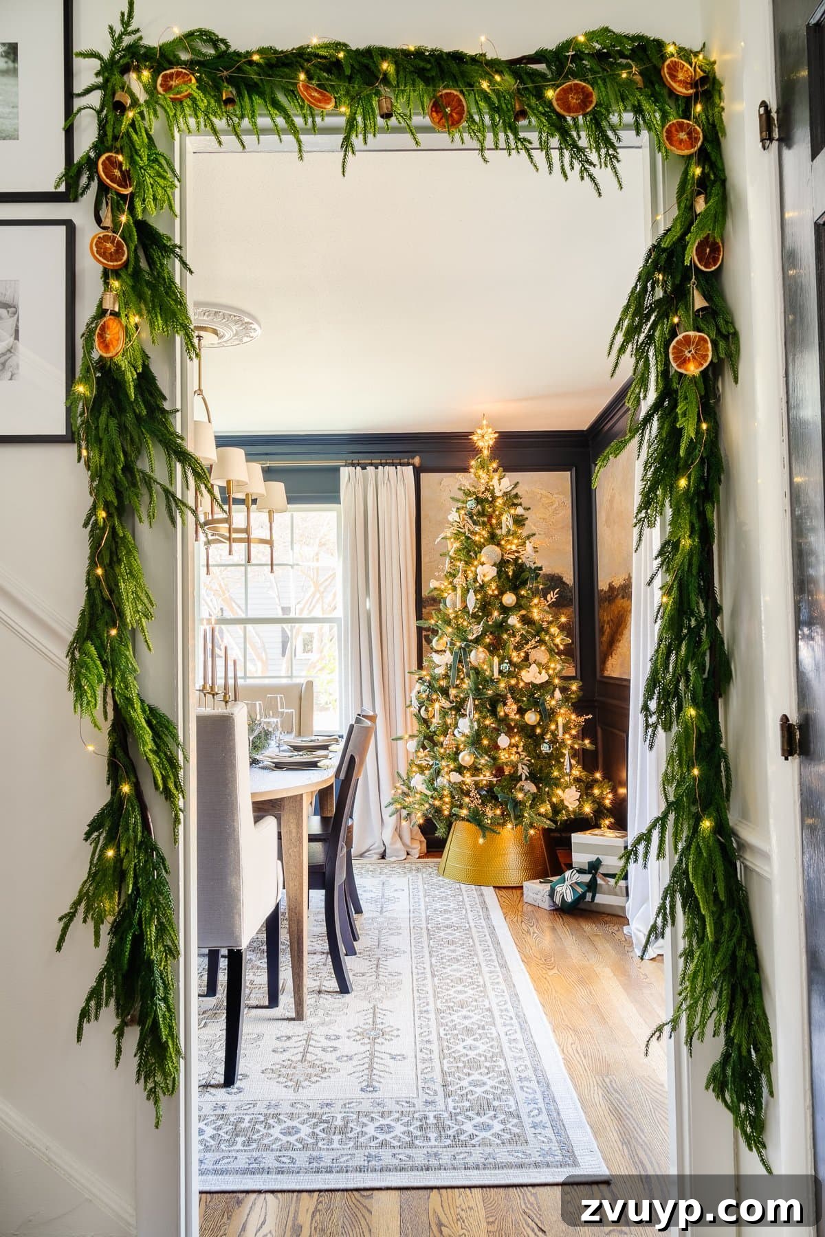 Effortless Homemade Dried Orange Garland 2 dried orange garland on greenery around a doorway