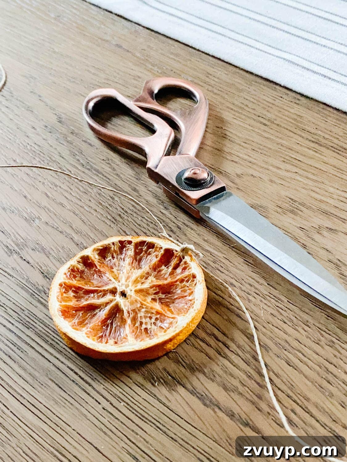 Effortless Homemade Dried Orange Garland 8 cut twine for hanging dried orange slices