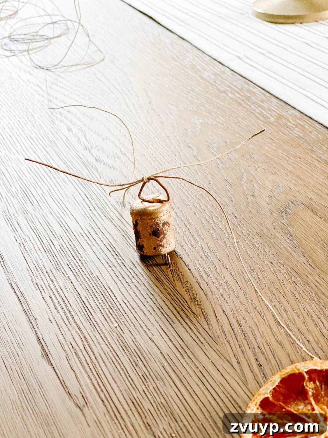 Effortless Homemade Dried Orange Garland 10 mini bells tied with twine