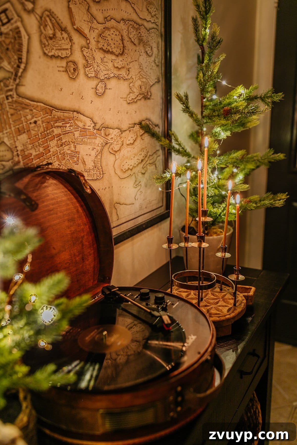 Enchanted Glow Tour 26 Candlelight Christmas decor featuring a vintage record player and other festive elements, creating a nostalgic and cozy holiday atmosphere in the home.