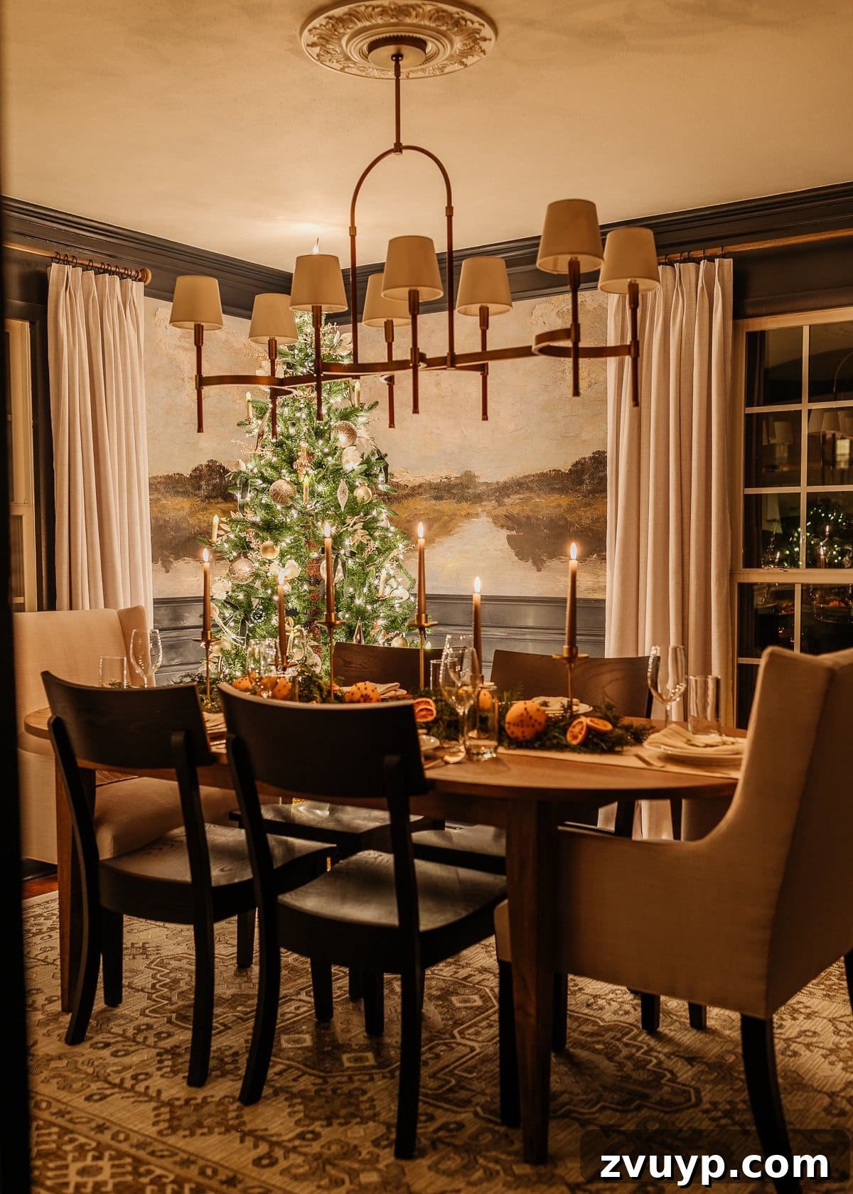 Enchanted Glow Tour 8 Elegant Christmas candlelight in the dining room, featuring a festive table adorned with holiday decor that sparkles under the soft, ambient lighting, ready for a cozy meal.