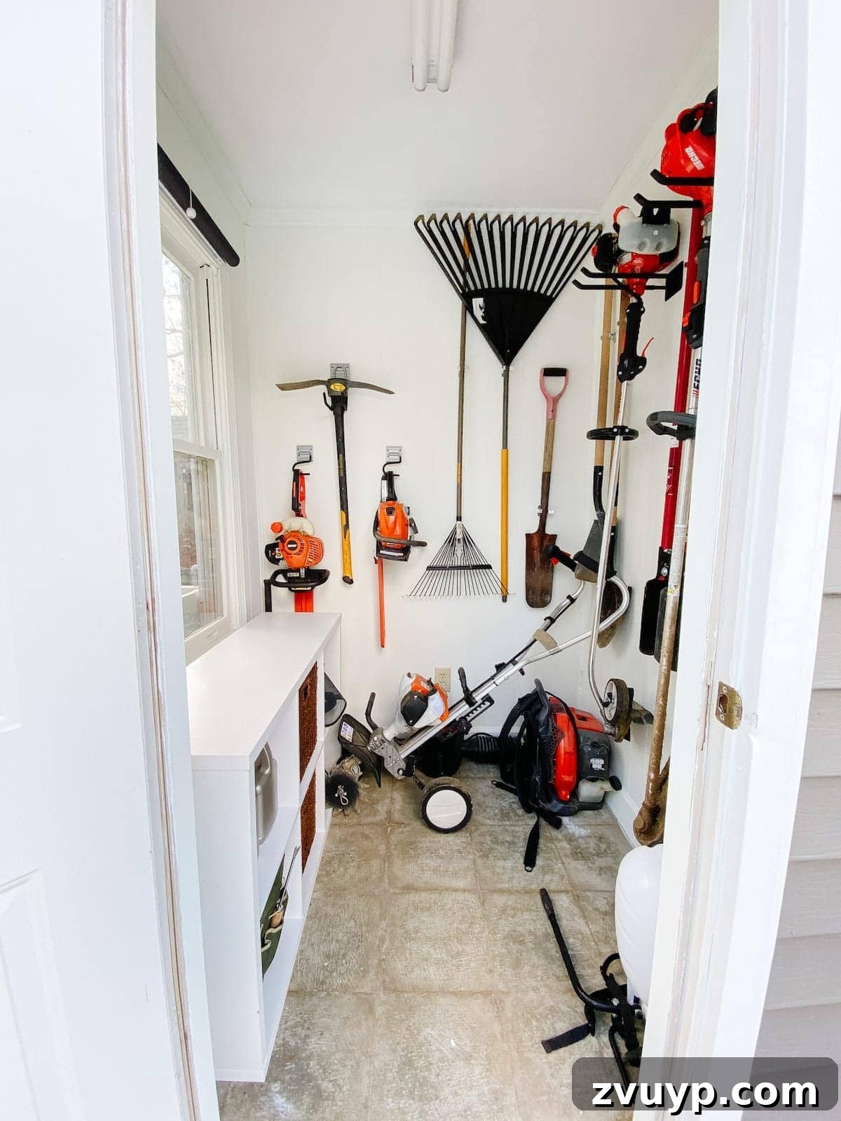 Our 21 Most Impressive Room Transformations of 2021 13 After: Our gardening shed after its overhaul, showcasing improved organization and fresh paint.