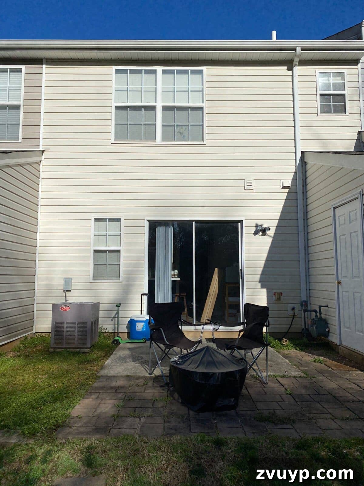 Our 21 Most Impressive Room Transformations of 2021 8 Before: Kristina's townhouse patio before the quick spruce-up.