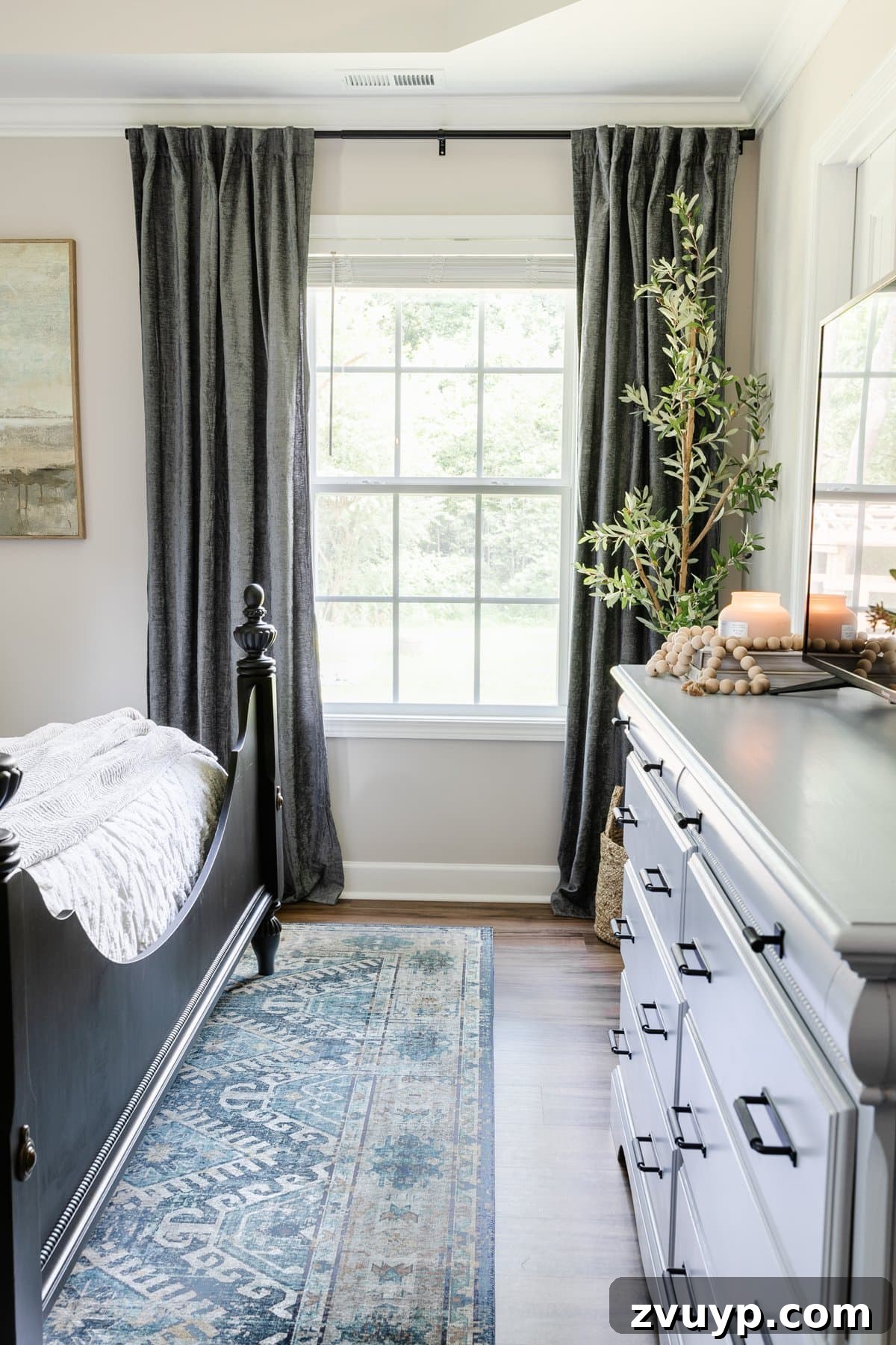 Your 2021 Product Champions 10 Elegant light-filtering chenille curtains adorning a bedroom window, providing privacy while allowing natural light to soften the room.