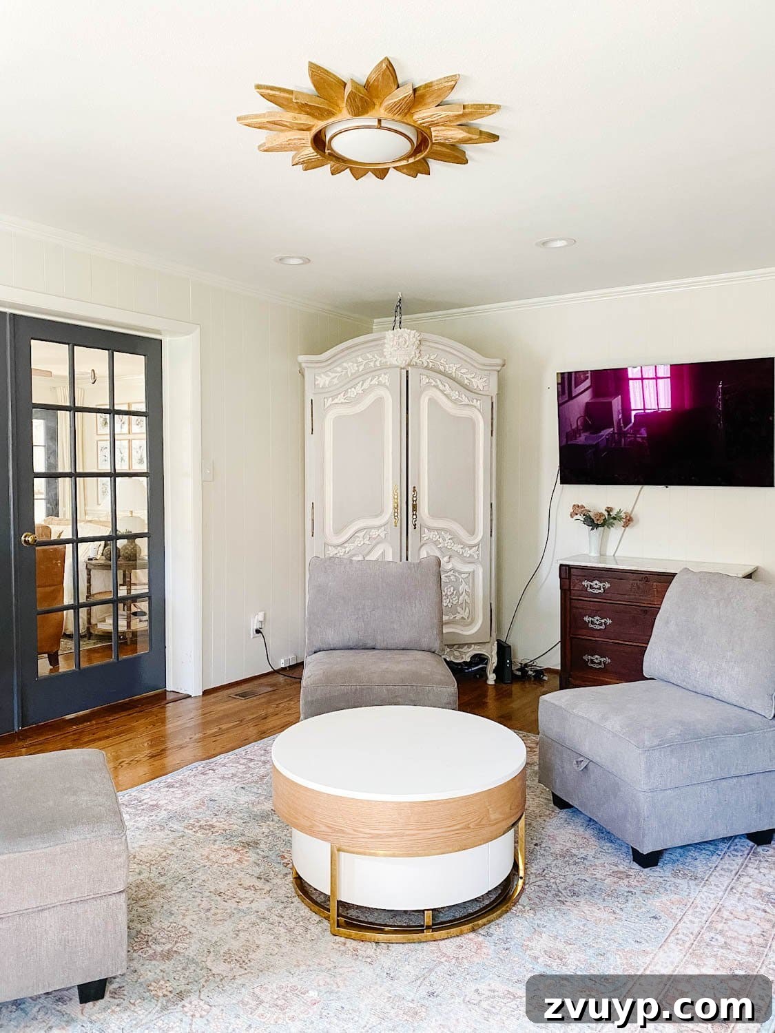 Shaping Our 2022 Home: Goals, Ideas, and Your Input 5 The other side of the playroom, currently unorganized with a television, awaiting a comprehensive storage and design reevaluation.