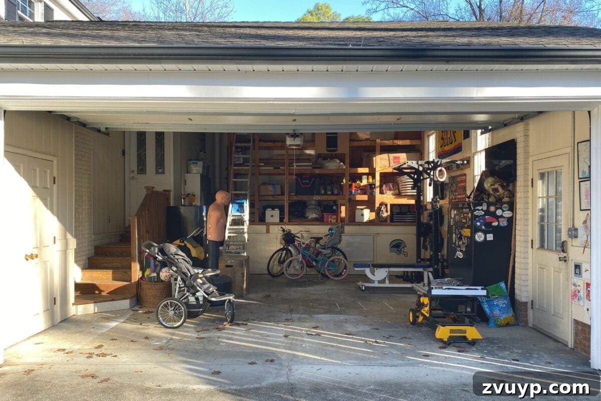 Shaping Our 2022 Home: Goals, Ideas, and Your Input 8 Cluttered and disorganized garage awaiting a complete overhaul, highlighting the need for efficient storage and improved aesthetics.