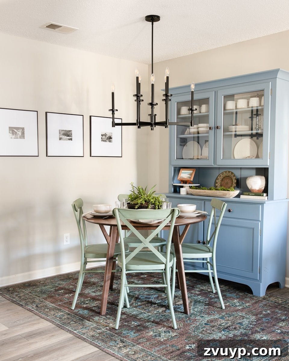 7 Instant Makeovers for Your Dining Nook 2 dining nook with black chandelier blue china cabinet green dining chairs and round dining table