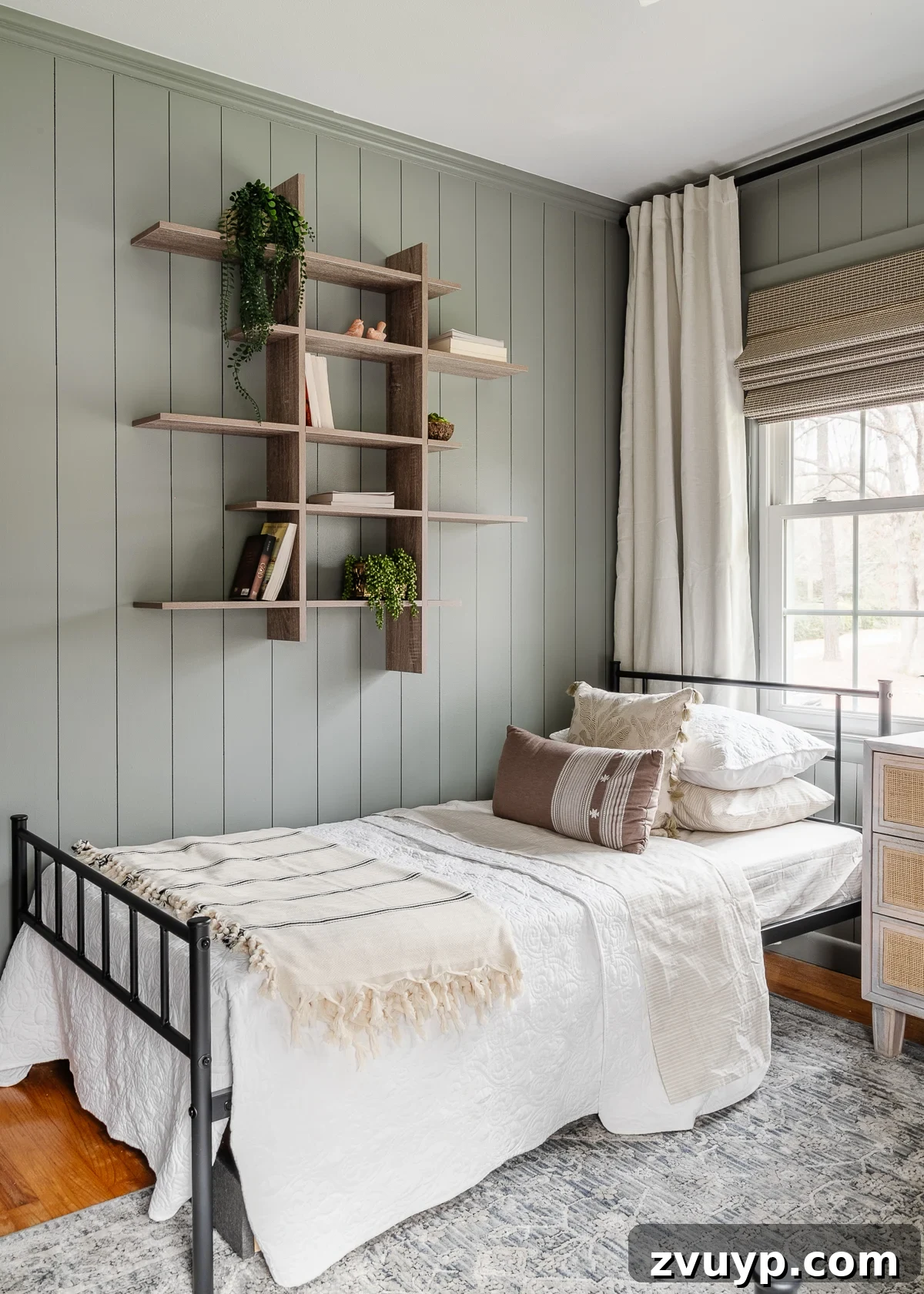 Sage Green Sanctuary: The Perfect Paint Colors for a Peaceful Retreat 16 Sage green bedroom painted Sherwin Williams Evergreen Fog with complementary colors