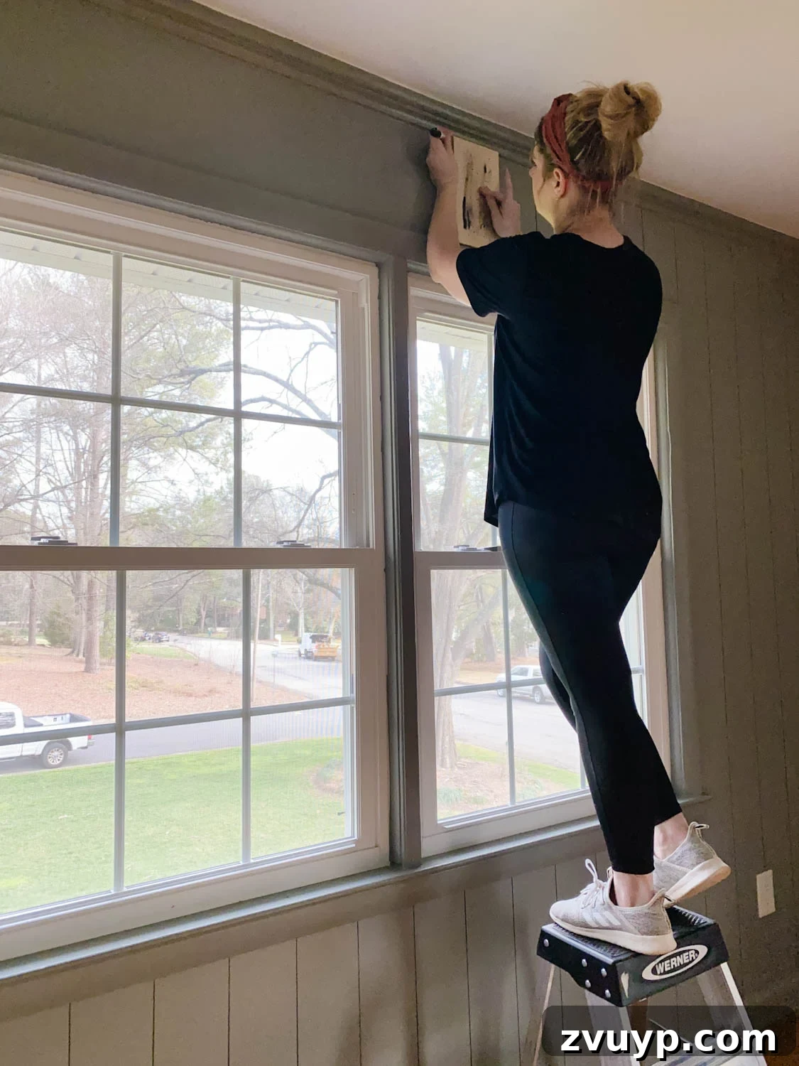 DIY Faux Wall Planks Whole Room Makeover for 20 Dollars 11 Tracing 1x6 boards with Sharpie paint pens for faux paneled walls over a window