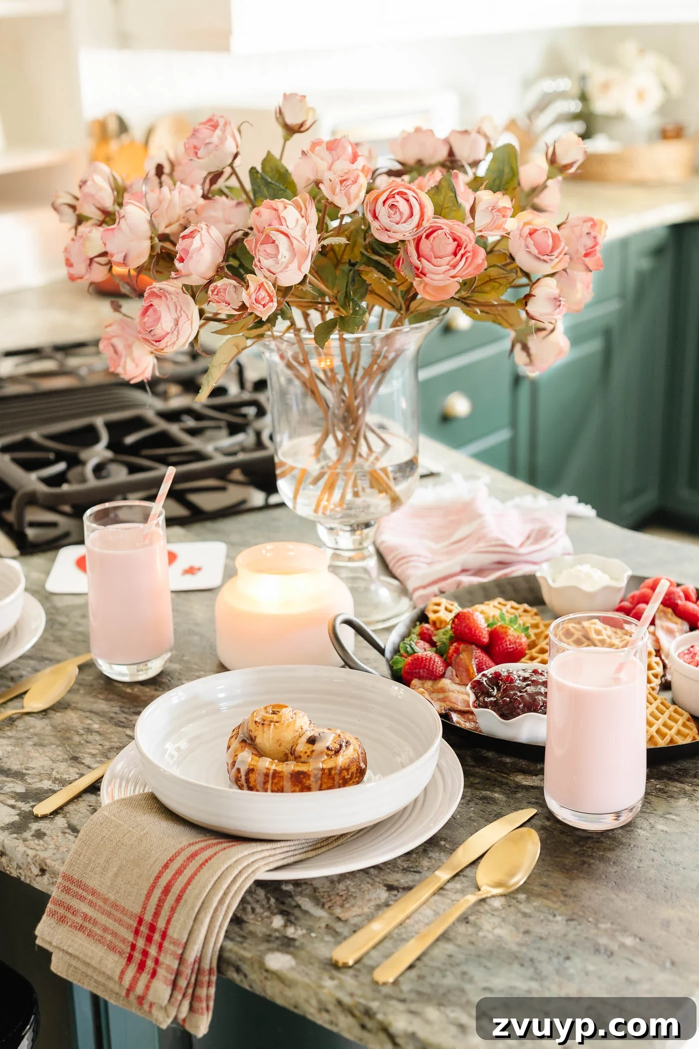 A Lover's Morning Board 7 Valentine's Day breakfast charcuterie board with place settings on kitchen counter and pink roses with candles