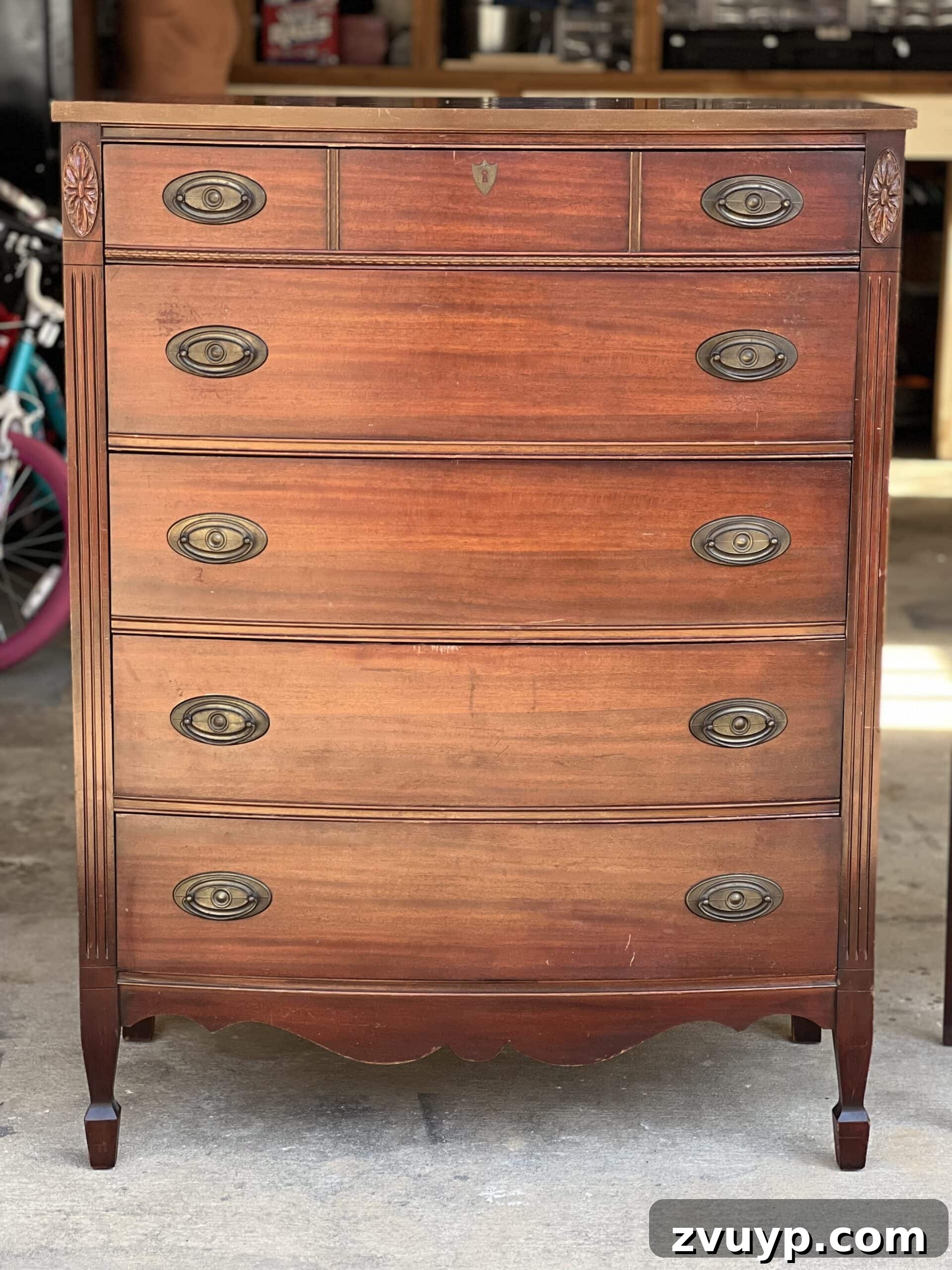 Make Old Wood Furniture Look Brand New 2 Before image of a dark wood chest of drawers covered in dust and grime