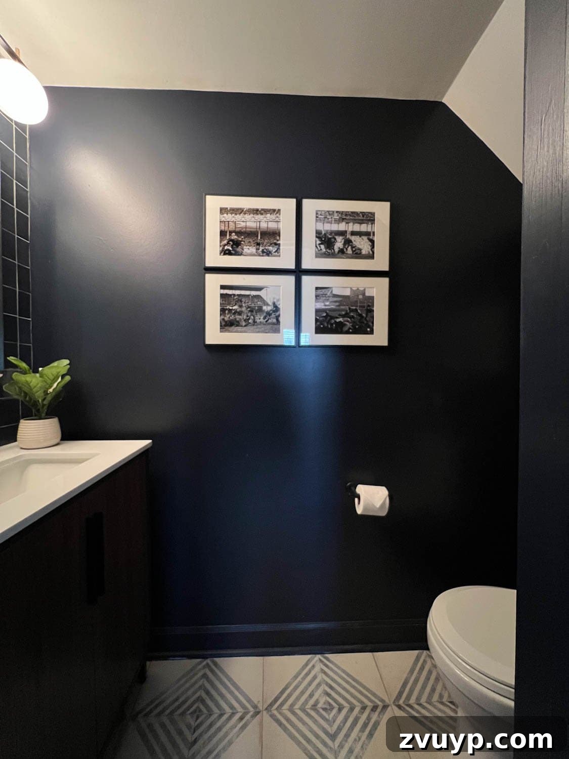 Sleek & Compact: Bachelor Pad Powder Room Makeover 6 navy blue modern powder room with patterned tile floor, showcasing walls and trim painted in the same uniform color