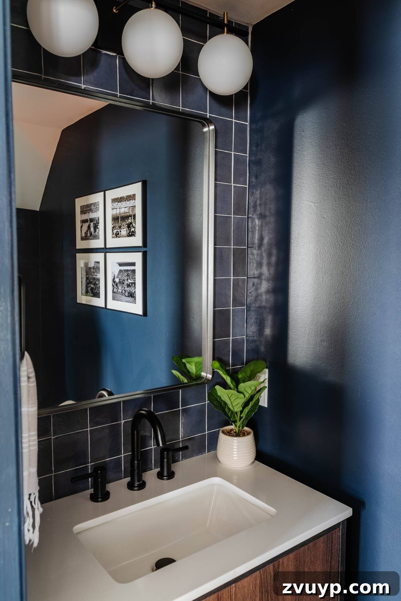 Sleek & Compact: Bachelor Pad Powder Room Makeover 8 using stacked tile on a wall for a modern style focal point behind a vanity in a small powder room, reflecting light and adding depth