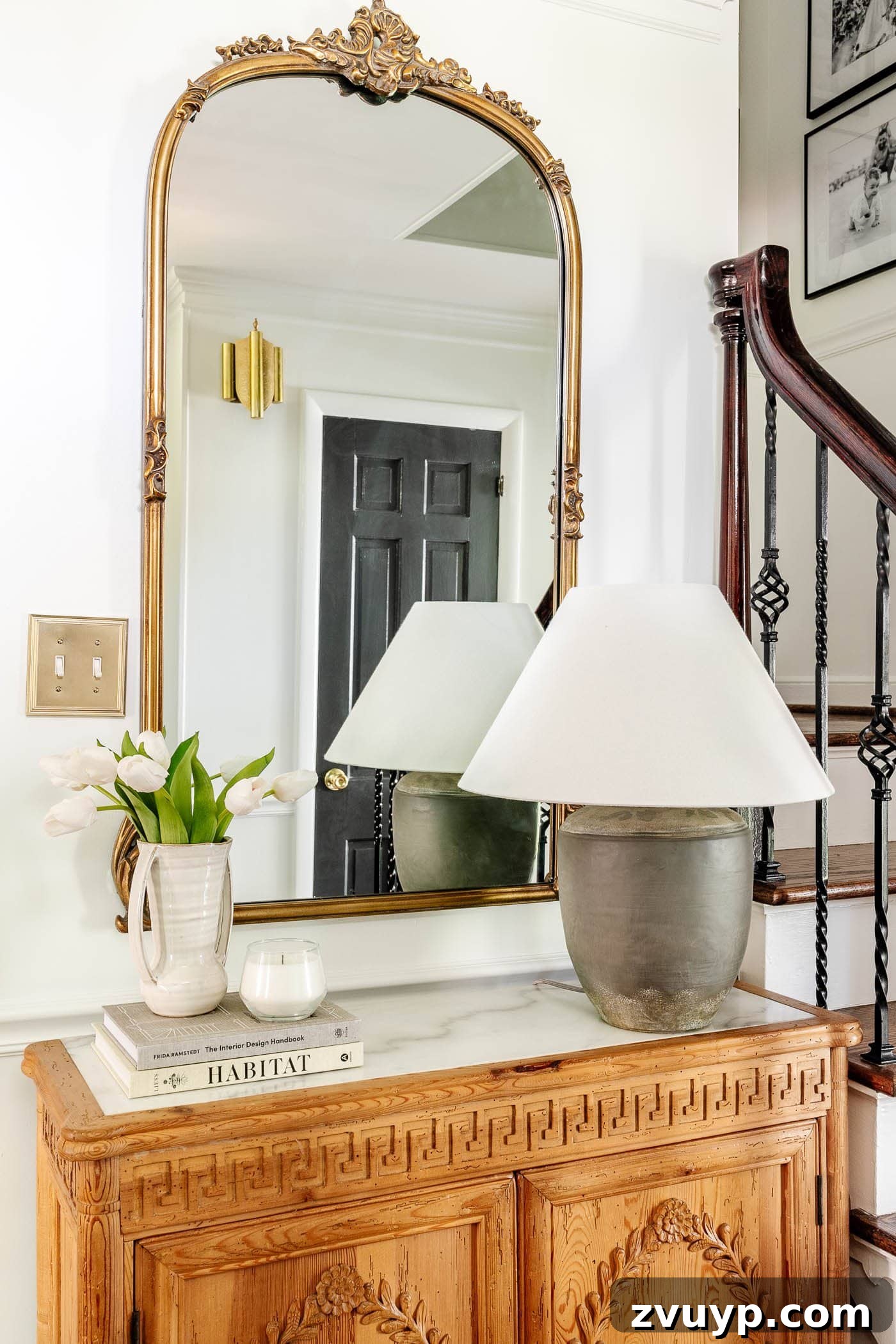 Pro Entry Table Styling: Your Step-by-Step Guide to a Stunning Entryway 8 adding a candle on a foyer table