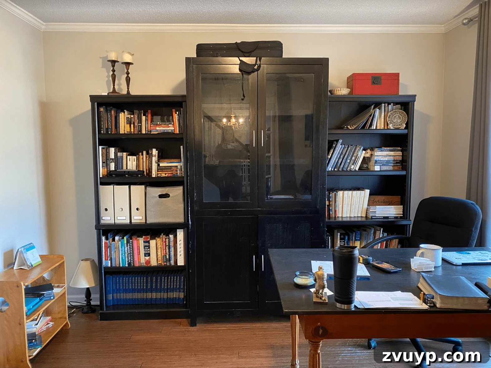 Our Next Project: Home Office and Study Room Design Concepts 4 Before photo of home office shelving, showing a basic, open unit that doesn't maximize vertical space.