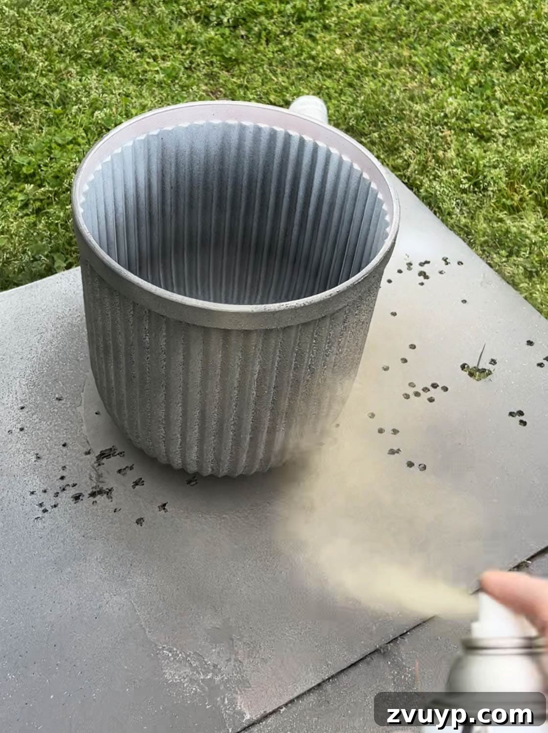 DIY Faux Concrete Planters: The Spray Paint Secret 7 spray painting outdoor planters to look like concrete