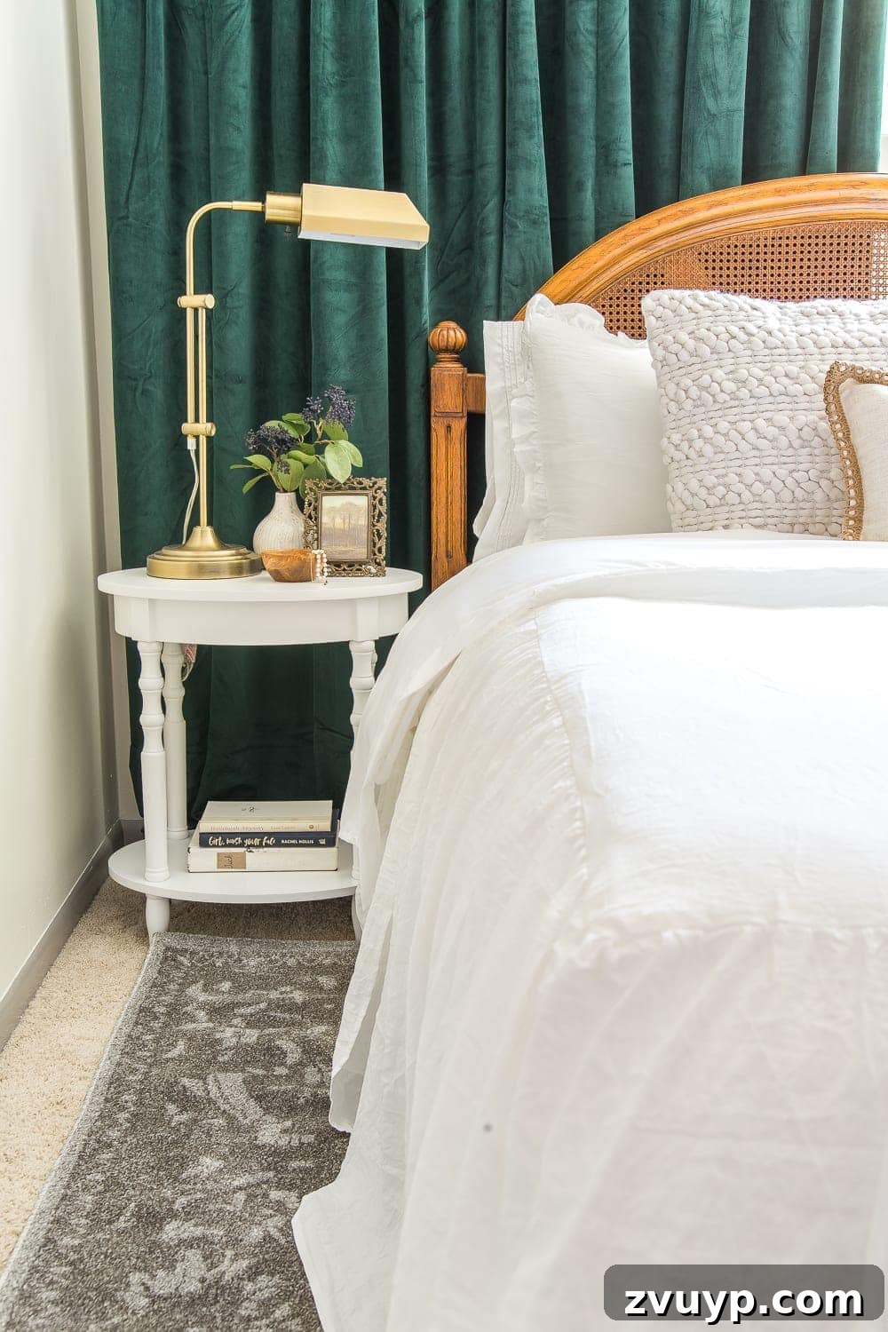 Faux Luxury Home Style for Less 10 white bedding and green curtains in a guest bedroom