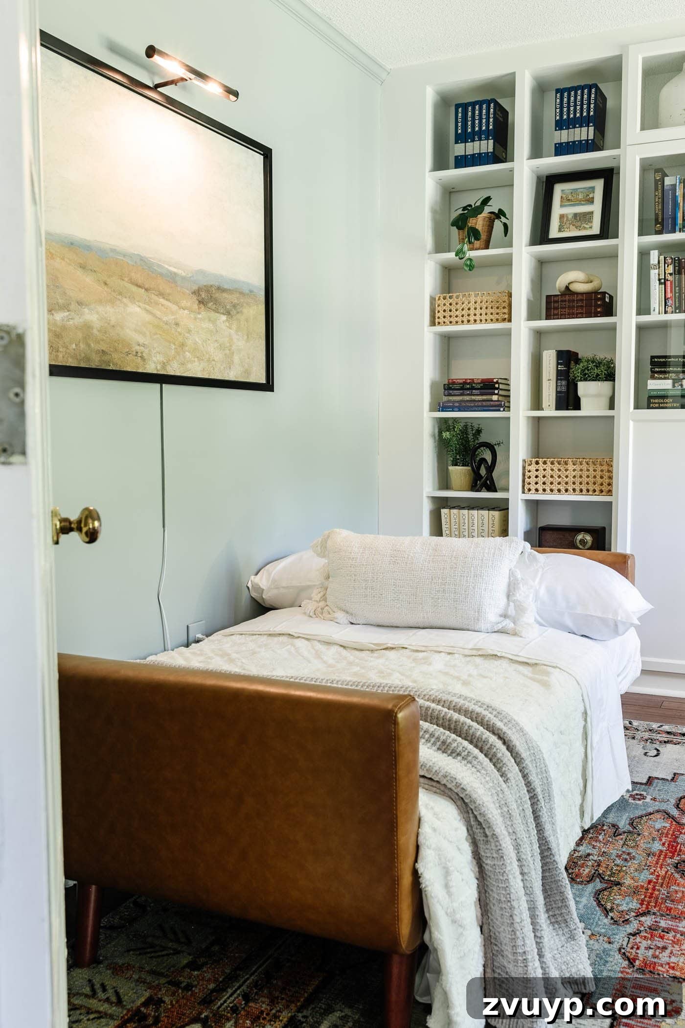 8 Productive Retreats: Design Your Home Office Lounge for Focus and Flow 8 Office converted into a guest bedroom using a futon, showcasing comfortable bedding and thoughtful decor