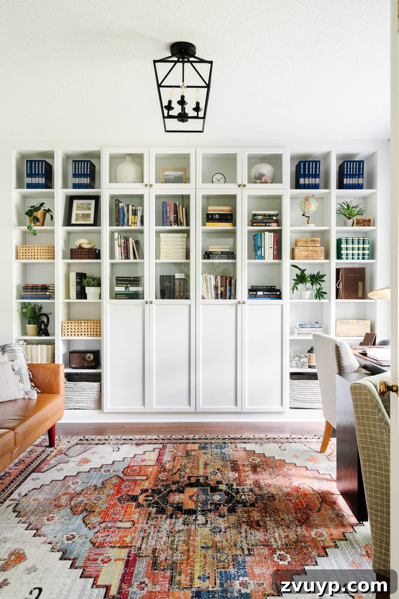 Elevate Your Home Office Setup Smart Tips Plus Full Reveal 17 home office setup with IKEA built in shelves, rug, desks, and futon
