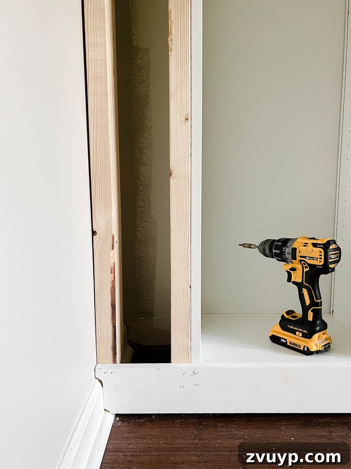 The IKEA Billy Hack: Custom Built-In Bookshelves Made Easy 19 1x4 board cut to the shape of a baseboard to make it look flush against the wall