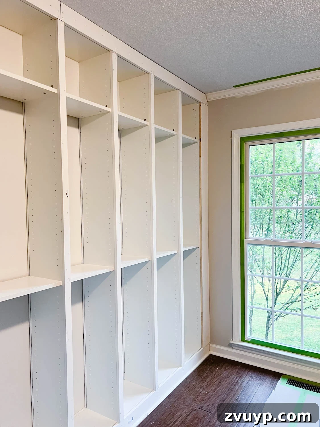 The IKEA Billy Hack: Custom Built-In Bookshelves Made Easy 21 added 1x2 boards to the fronts of bookcases to hide the cracks where they meet