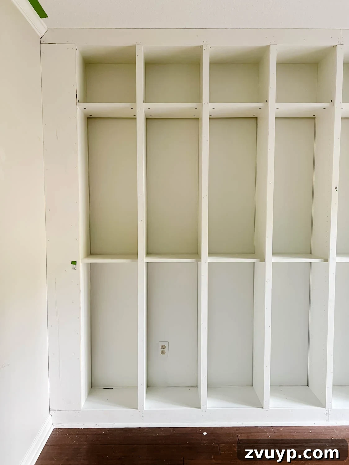 The IKEA Billy Hack: Custom Built-In Bookshelves Made Easy 22 boards added to IKEA billy bookcases to make them look like built in bookshelves