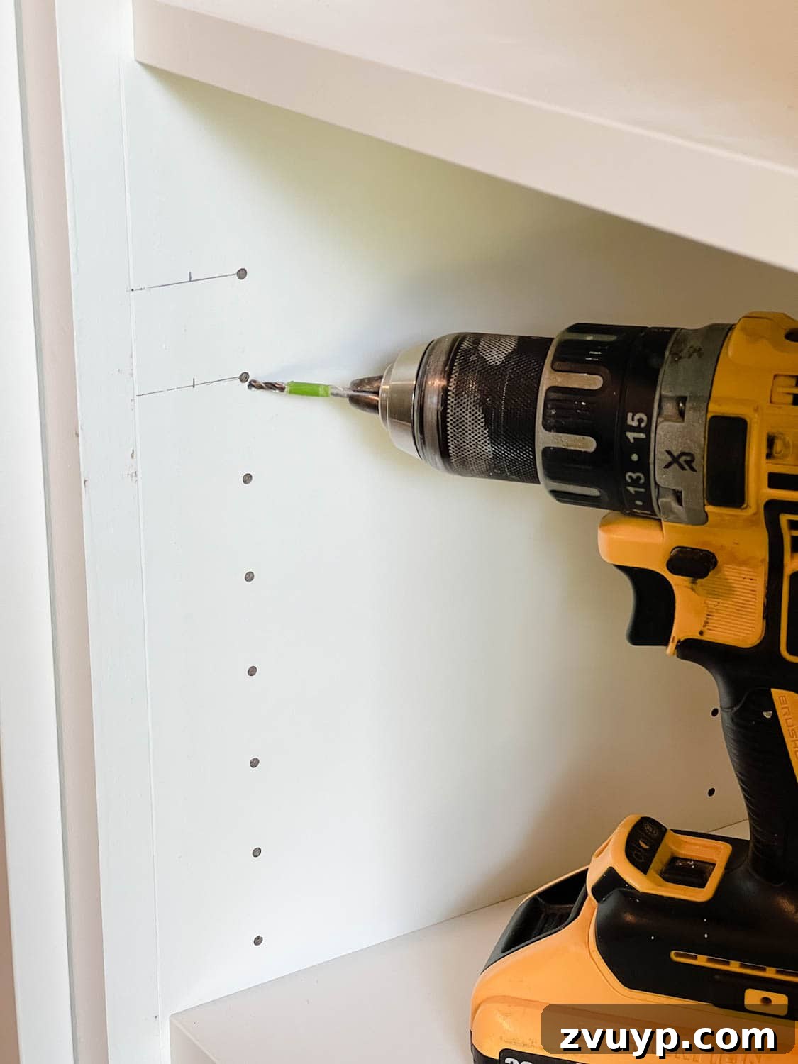 The IKEA Billy Hack: Custom Built-In Bookshelves Made Easy 32 using tape on a drill bit to mark hole depth