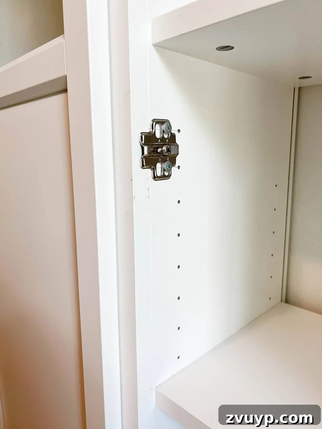 The IKEA Billy Hack: Custom Built-In Bookshelves Made Easy 33 door hardware added to bookcases to hang Oxberg doors