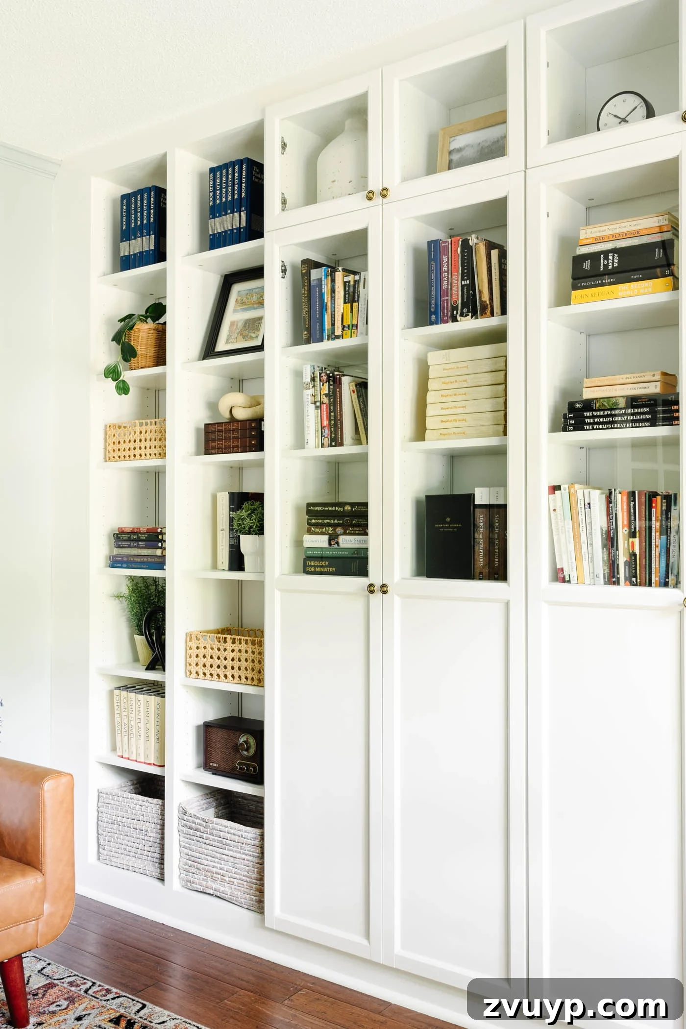 The IKEA Billy Hack: Custom Built-In Bookshelves Made Easy 37 shelf decor in a home office with glass front doors