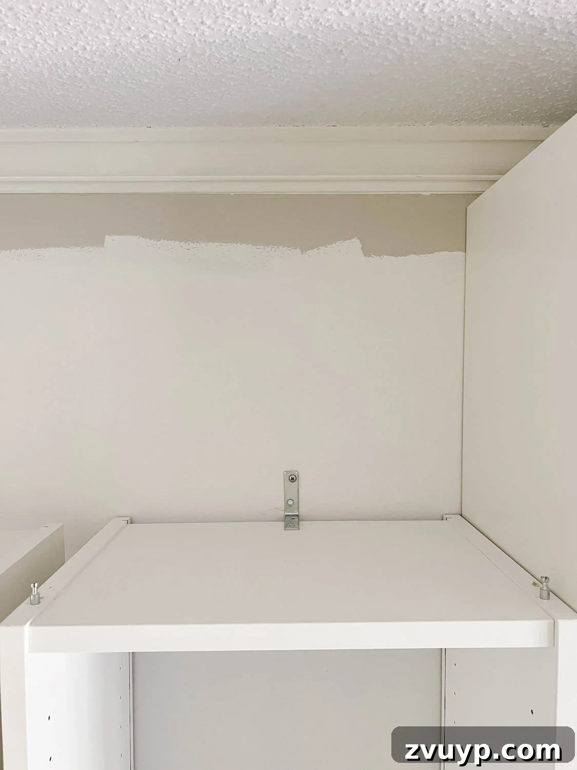 The IKEA Billy Hack: Custom Built-In Bookshelves Made Easy 9 anchor added to the back of a bookcase to keep it attached to the wall