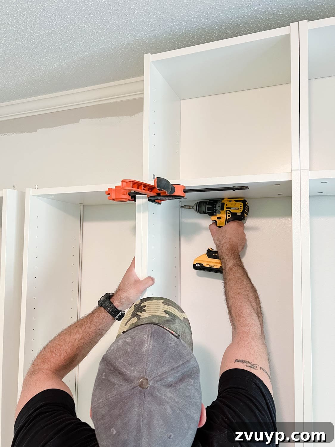 The IKEA Billy Hack: Custom Built-In Bookshelves Made Easy 10 clamping bookcases and attaching them together with wood screws