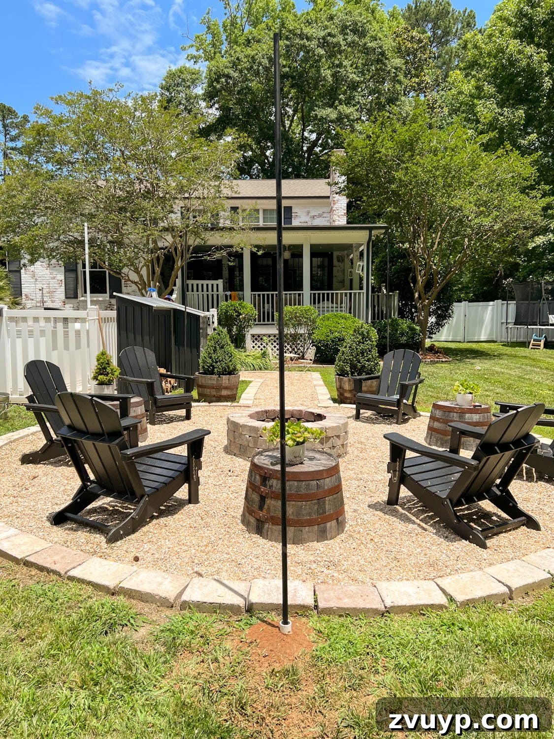 No Poles, No Problem: Creative Ways to Hang Backyard String Lights 19 DIY string light poles around a fire pit made of conduit and PVC pipe
