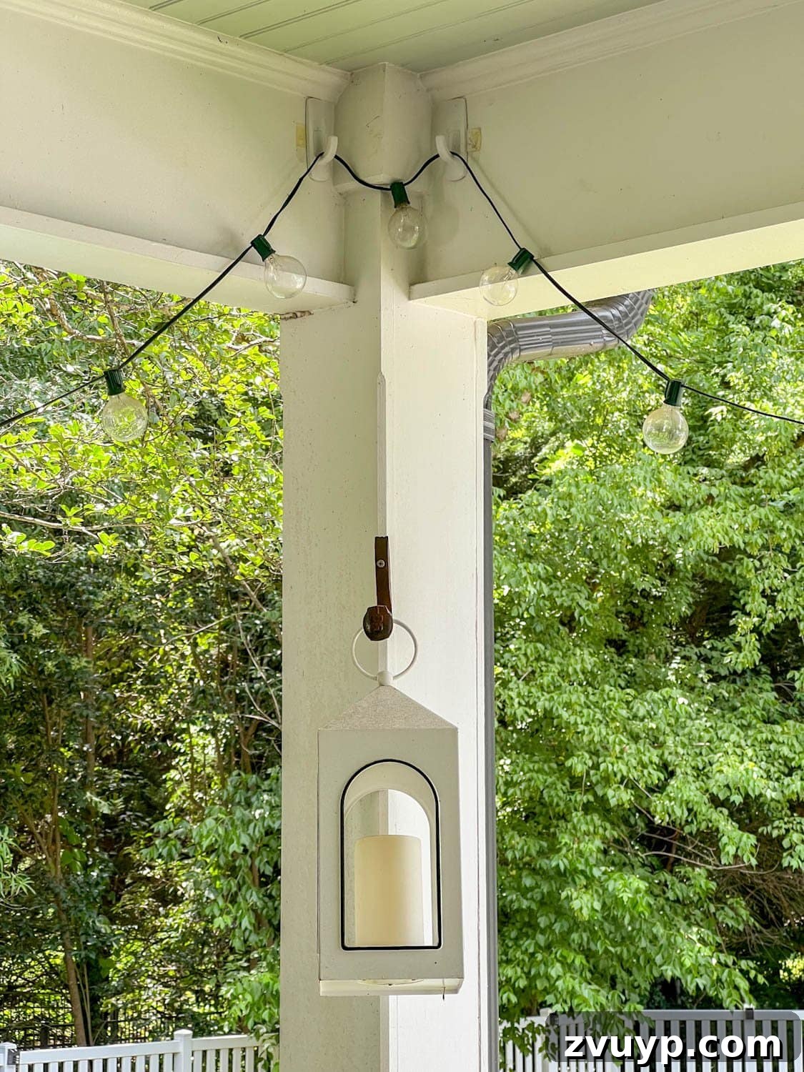 No Poles, No Problem: Creative Ways to Hang Backyard String Lights 52 porch string lights hanging from Command hooks