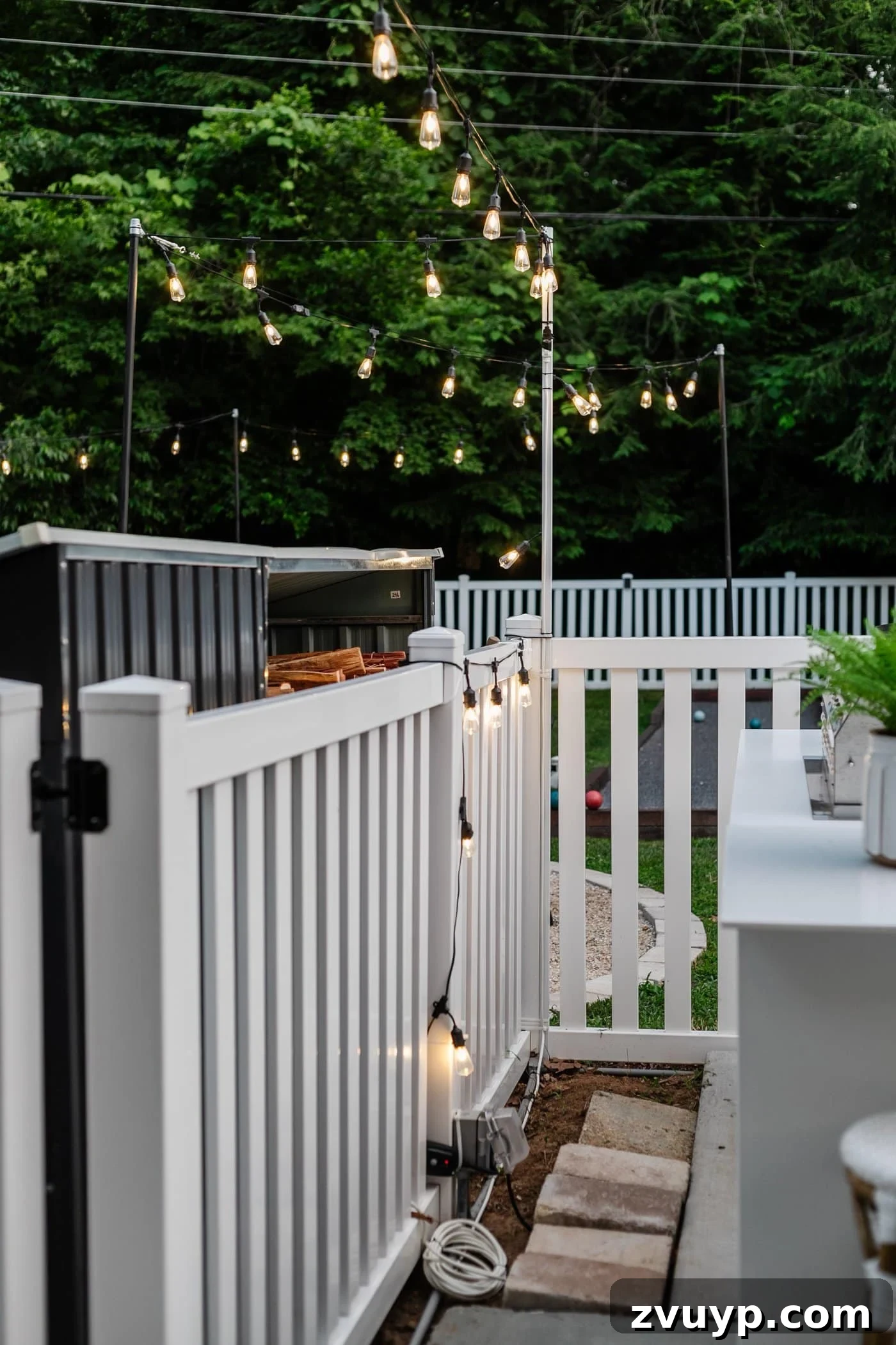 No Poles, No Problem: Creative Ways to Hang Backyard String Lights 7 plug in outdoor lights with an outlet, outdoor extension cord, and outdoor timer