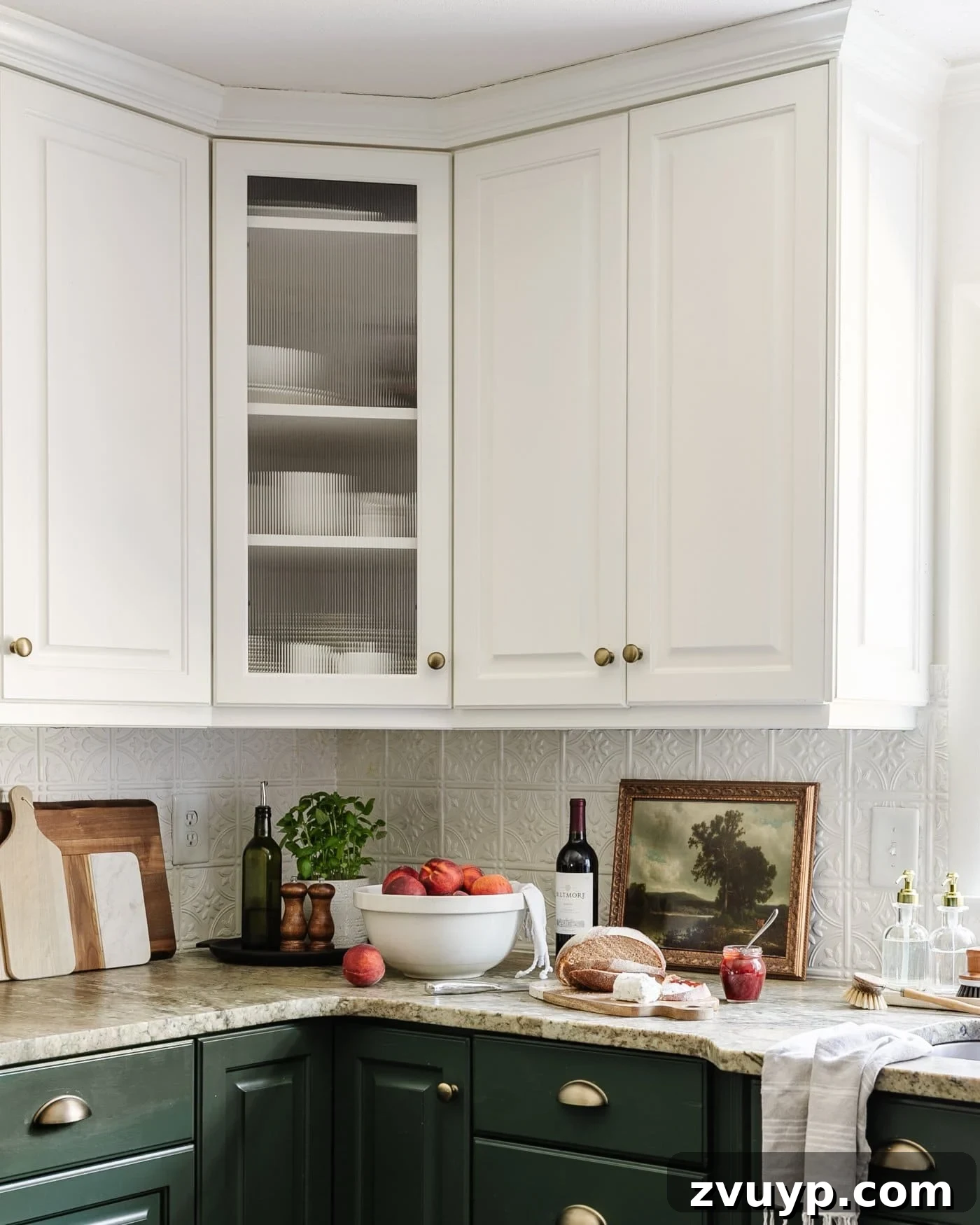 Stylish Glass on a Budget Window Film Ideas for Your Home 2 reeded glass cabinet door using decorative window film in a kitchen with bowl of peaches, tray, and vintage art