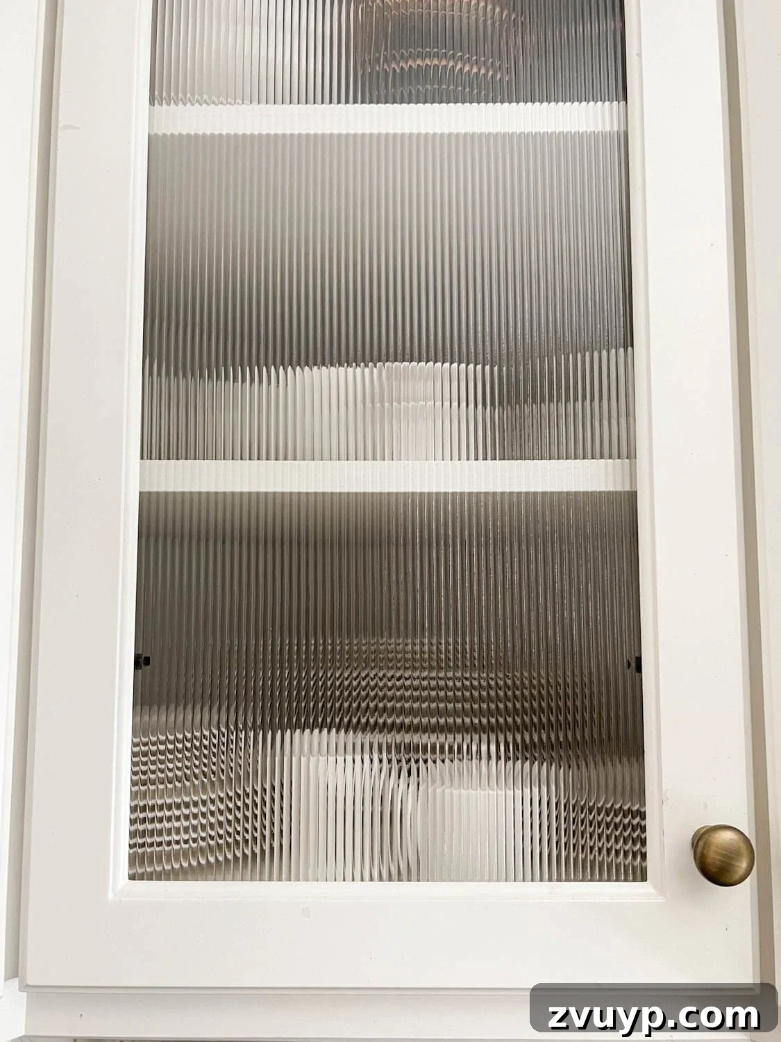 Stylish Glass on a Budget Window Film Ideas for Your Home 3 reeded glass kitchen cabinet door with decorative window film