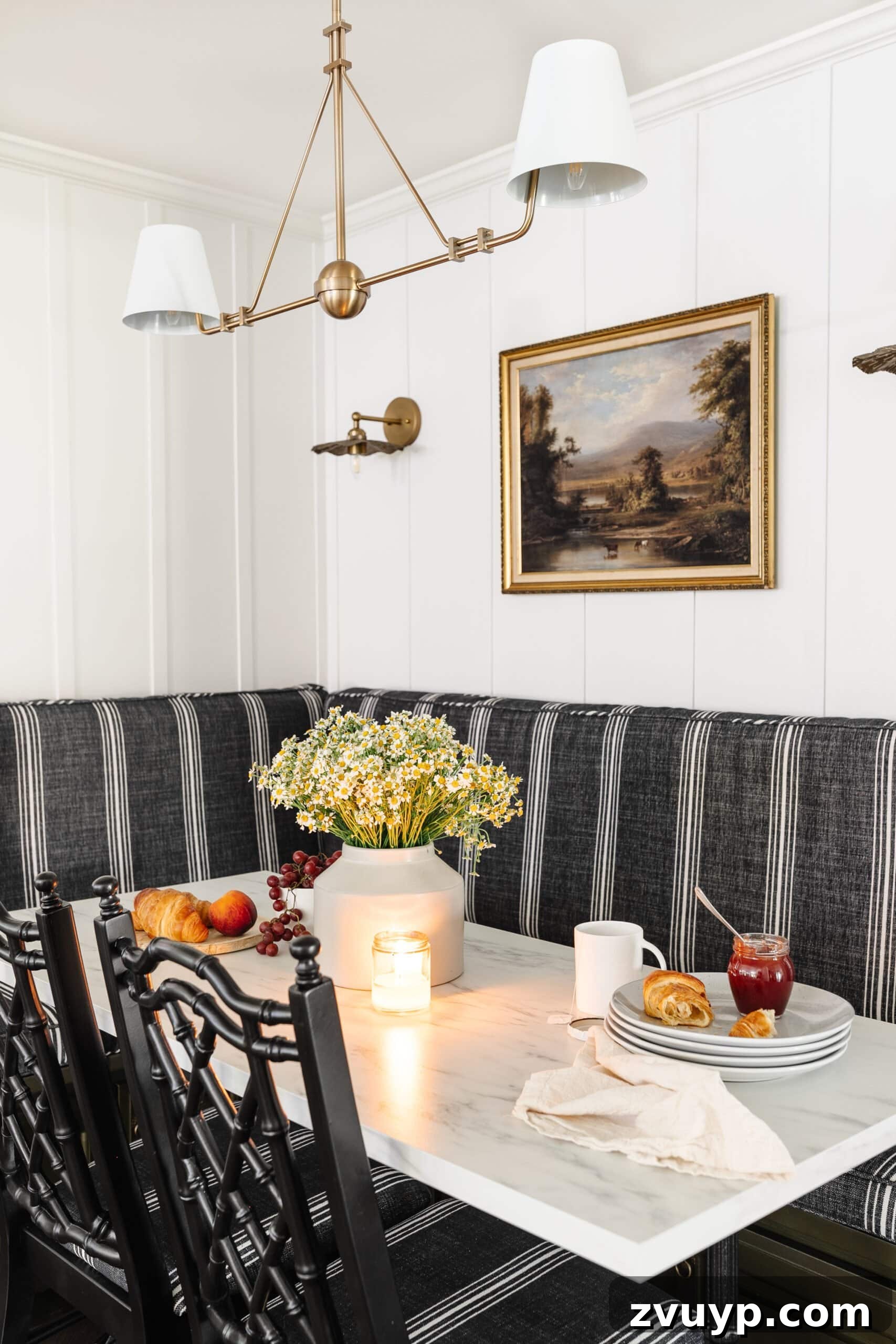 Corner Kitchen Refresh From Dated to Dazzling 11 bistro style marble table, white batten walls, vintage art, and bamboo dining chairs