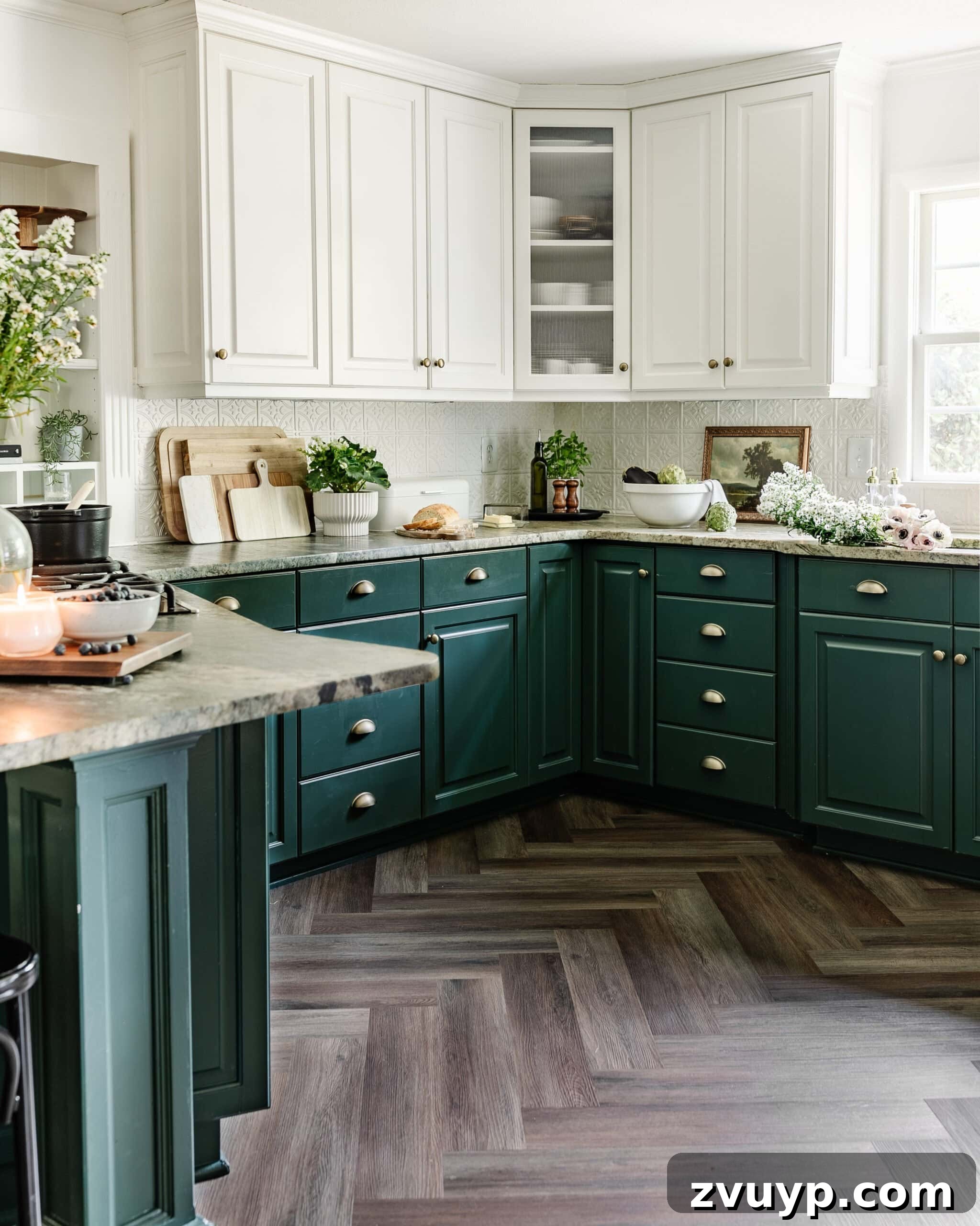 Corner Kitchen Refresh From Dated to Dazzling 21 kitchen with green lower cabinets and white upper cabinets, herringbone LVP flooring