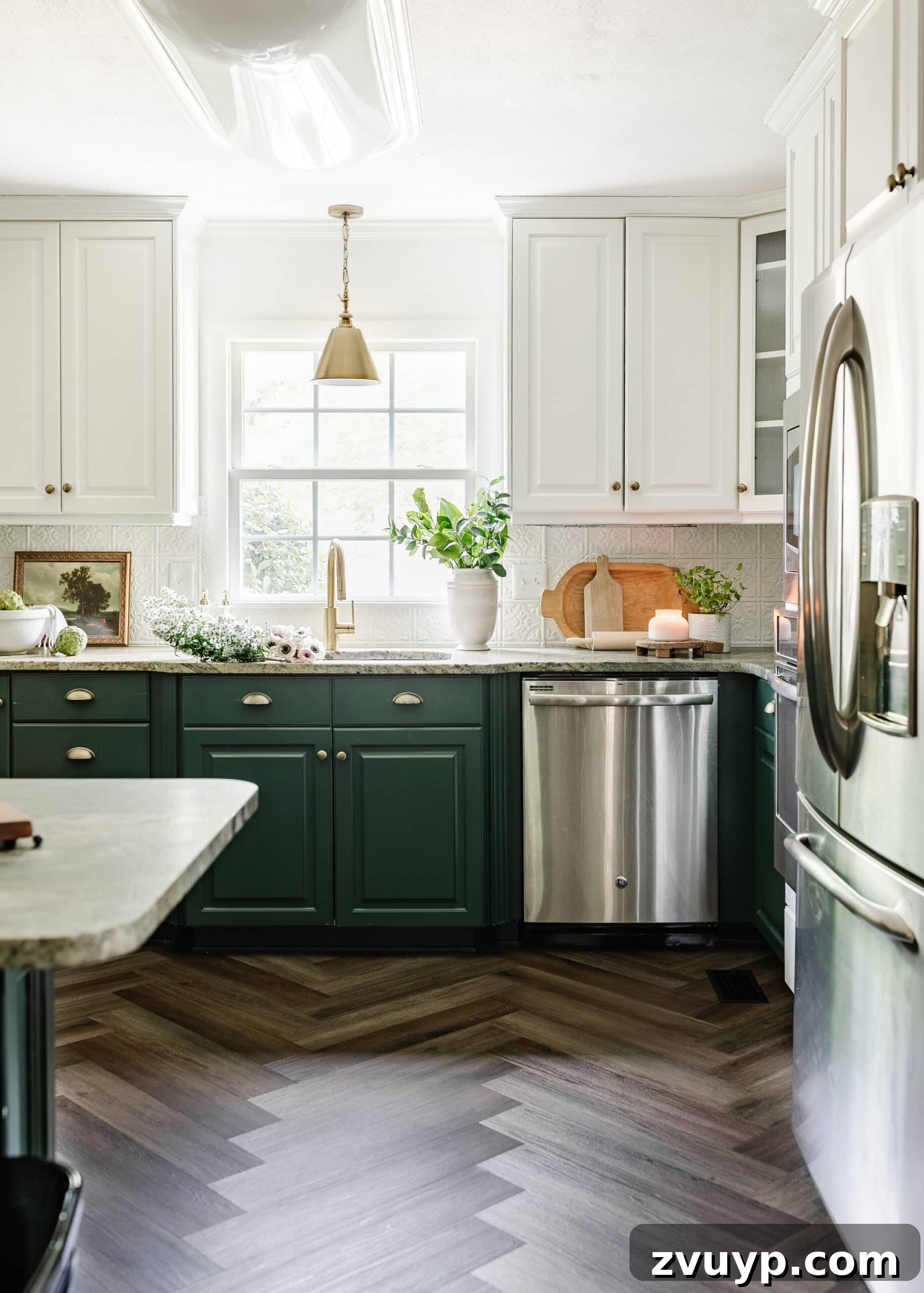 Corner Kitchen Refresh From Dated to Dazzling 29 kitchen decor with sink in front of window, green cabinets, and cutting boards styled on countertop
