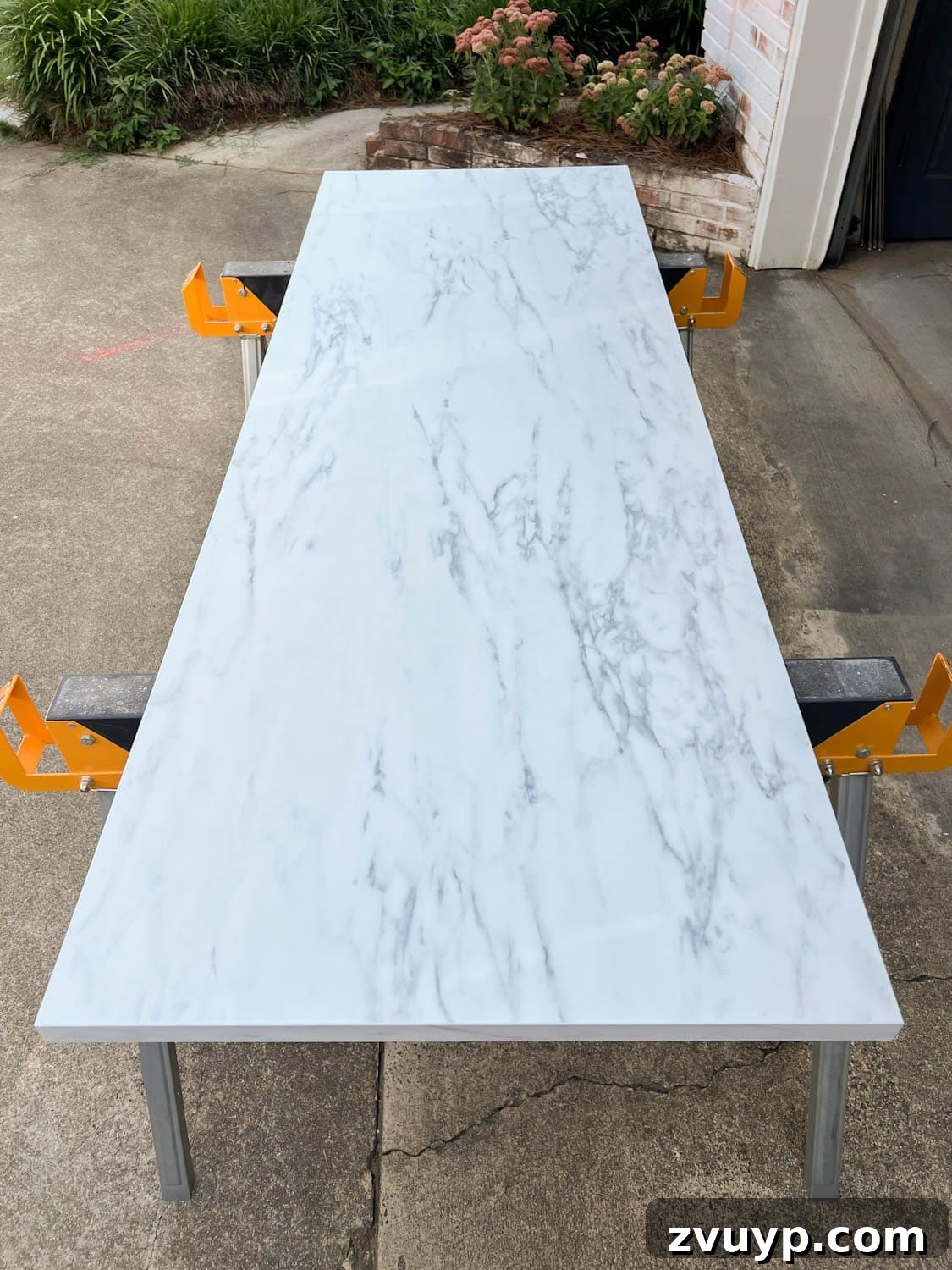 One Hour Faux Marble Dining Table Makeover 4 laminate faux marble countertop on saw horses