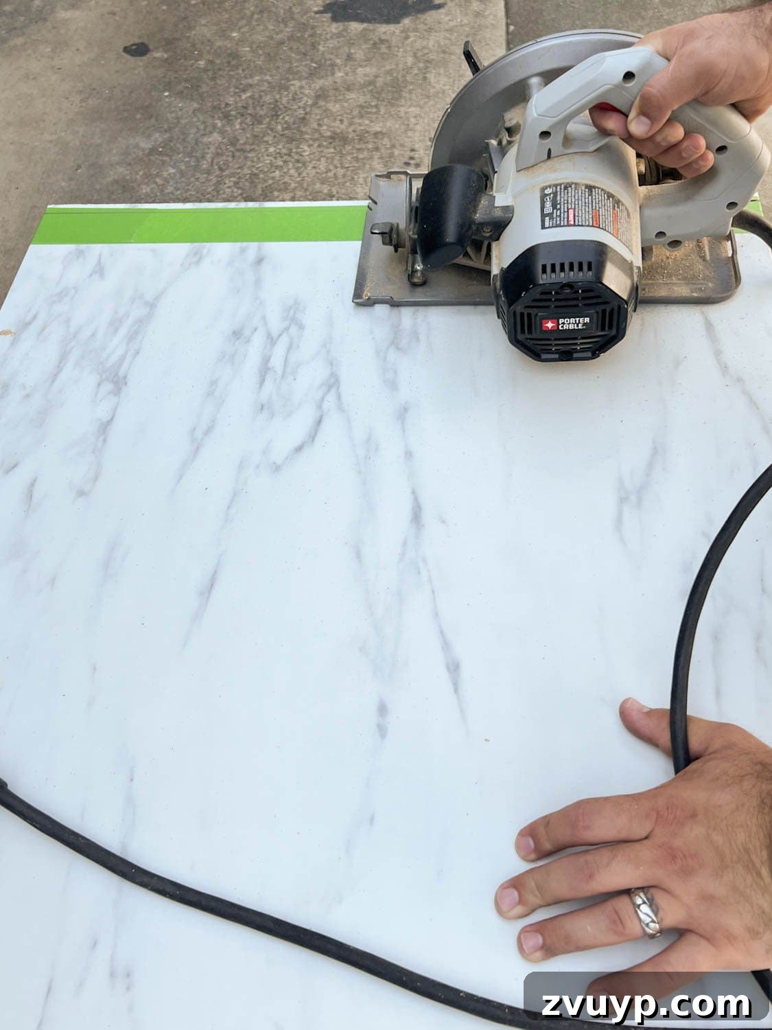 One Hour Faux Marble Dining Table Makeover 7 cutting laminate faux marble countertop with a circular saw