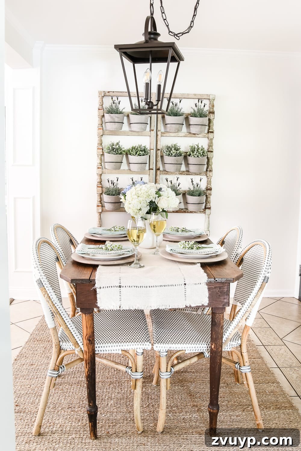 Bonjour Mornings: Your Cozy Parisian Bistro Nook 18 rustic farmhouse style breakfast nook with wall planter, farmhouse wood table, and French bistro chairs