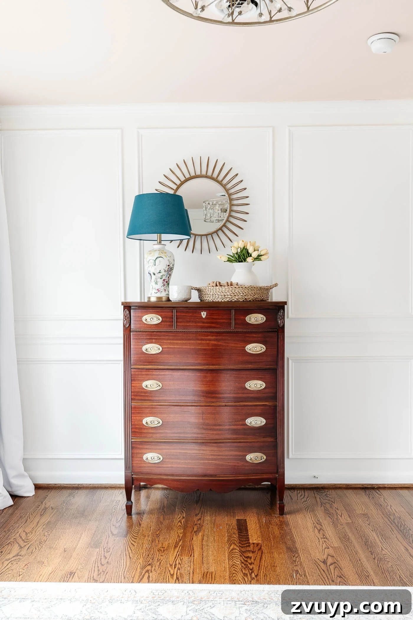 Our Home's Incredible 5-Year Transformation Tour 56 charming cottagecore girl's bedroom featuring a soft blush pink ceiling, classic wood furniture, and elegant picture frame molding, creating a harmonious and tranquil retreat