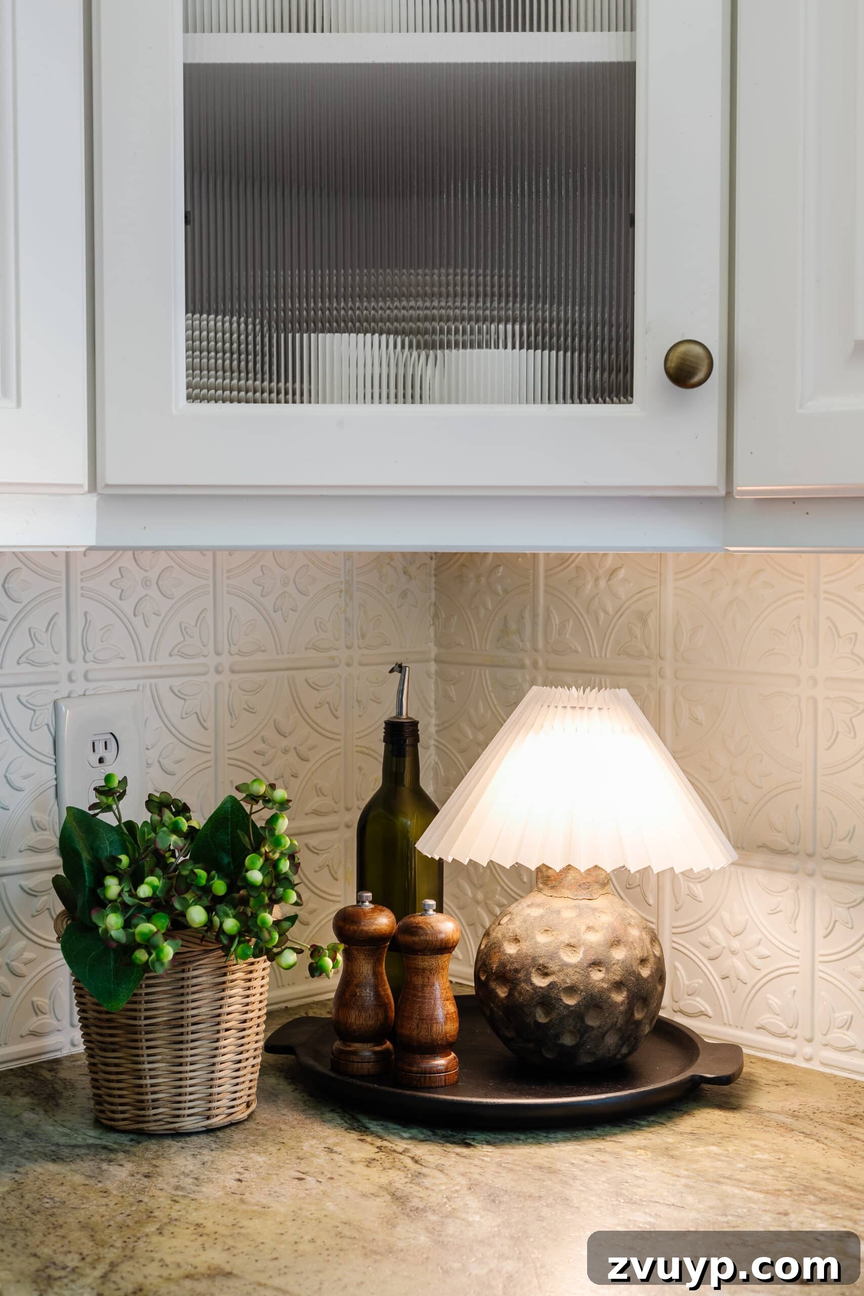 Vase to Lamp Cordless Terracotta Project 4 battery operated mini lamp on a kitchen countertop with pleated shade, black tray, and plant