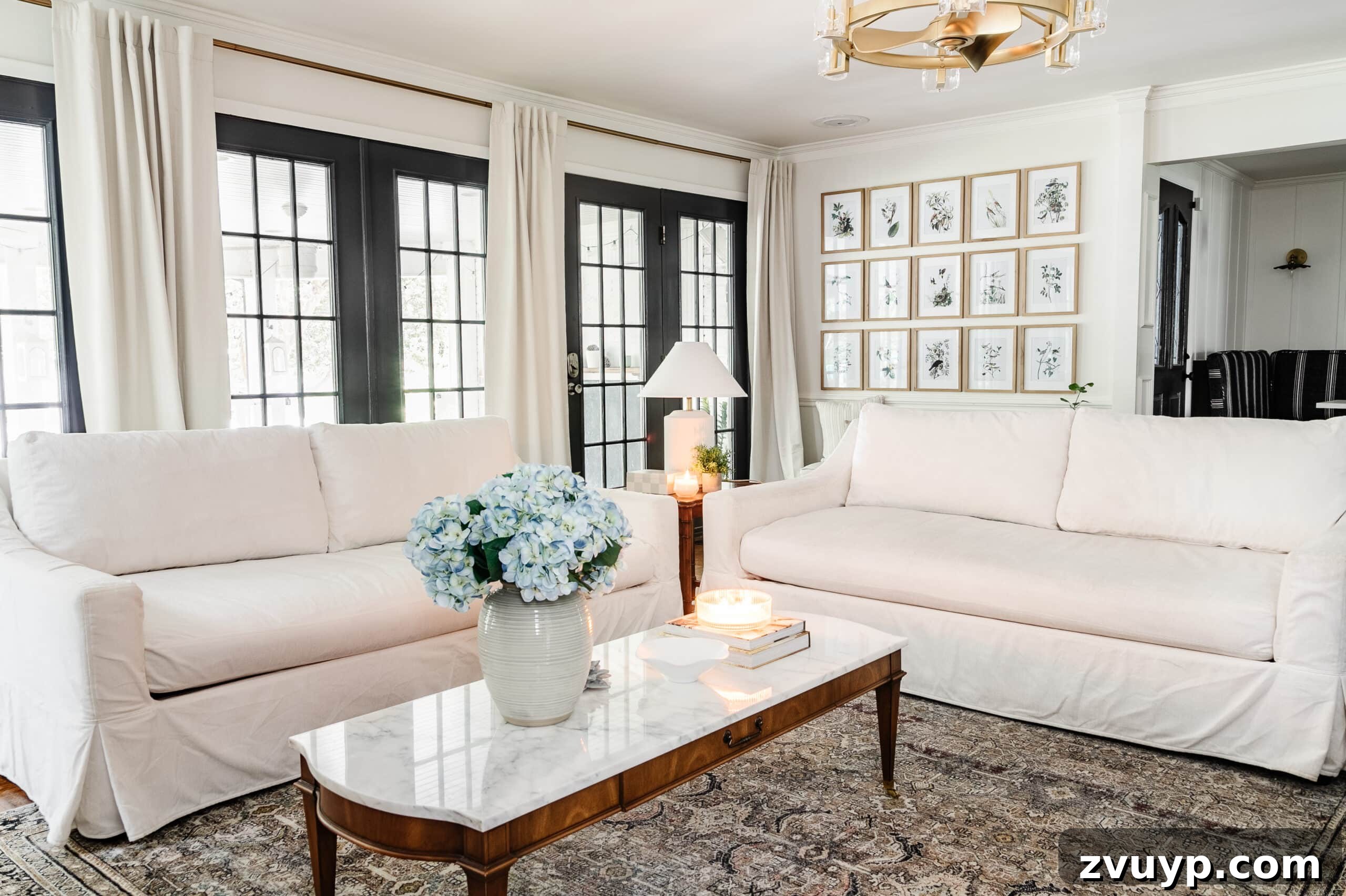 Revive Your Fabric Furniture The Ultimate Upholstery Deep Clean 15 Two pristine white clean couches with white slipcovers elegantly arranged in a cozy living room setting.