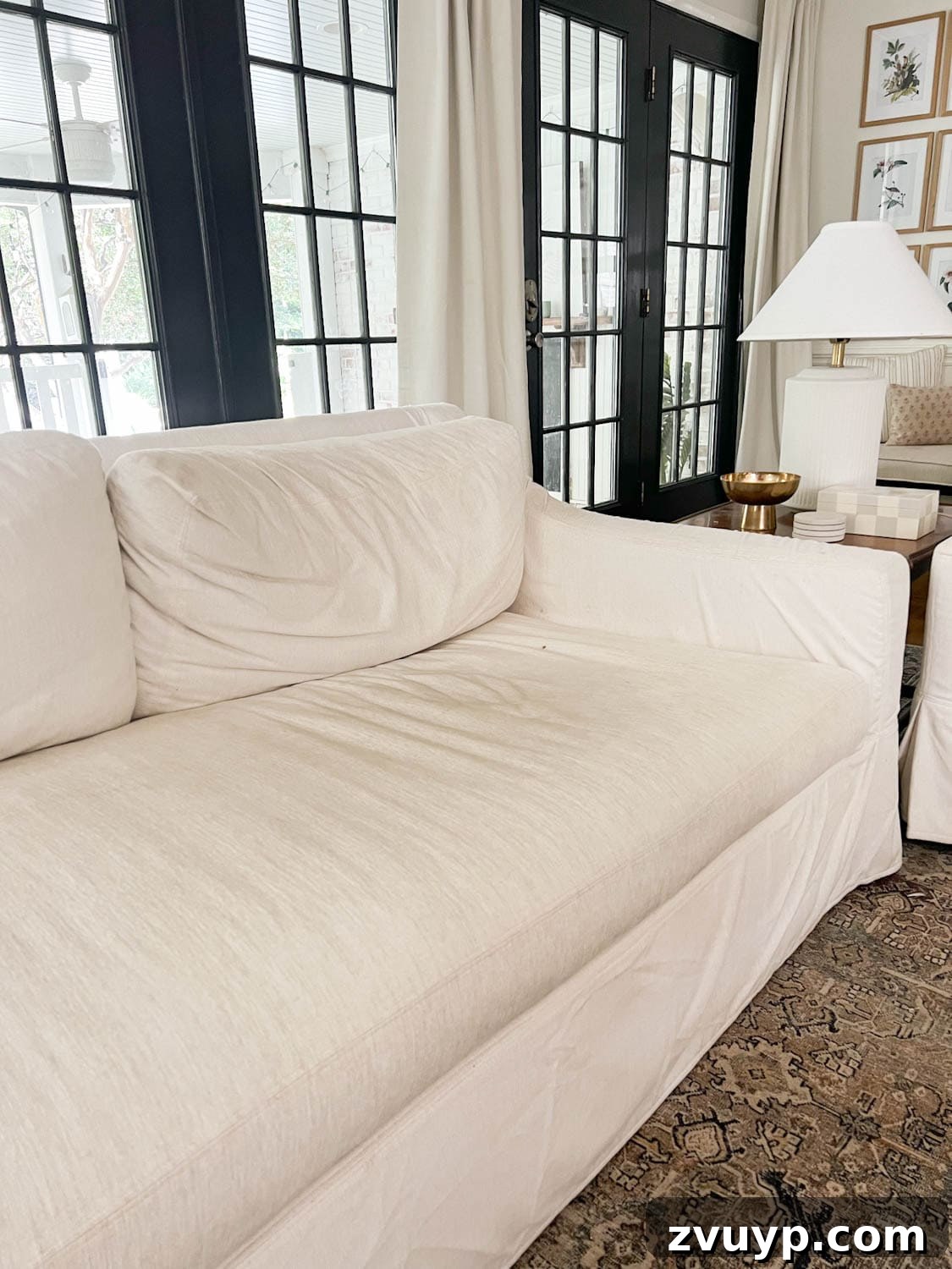 Revive Your Fabric Furniture The Ultimate Upholstery Deep Clean 3 Before shot of a Pottery Barn couch with Sunbrella fabric showing visible dirt and discoloration before cleaning.