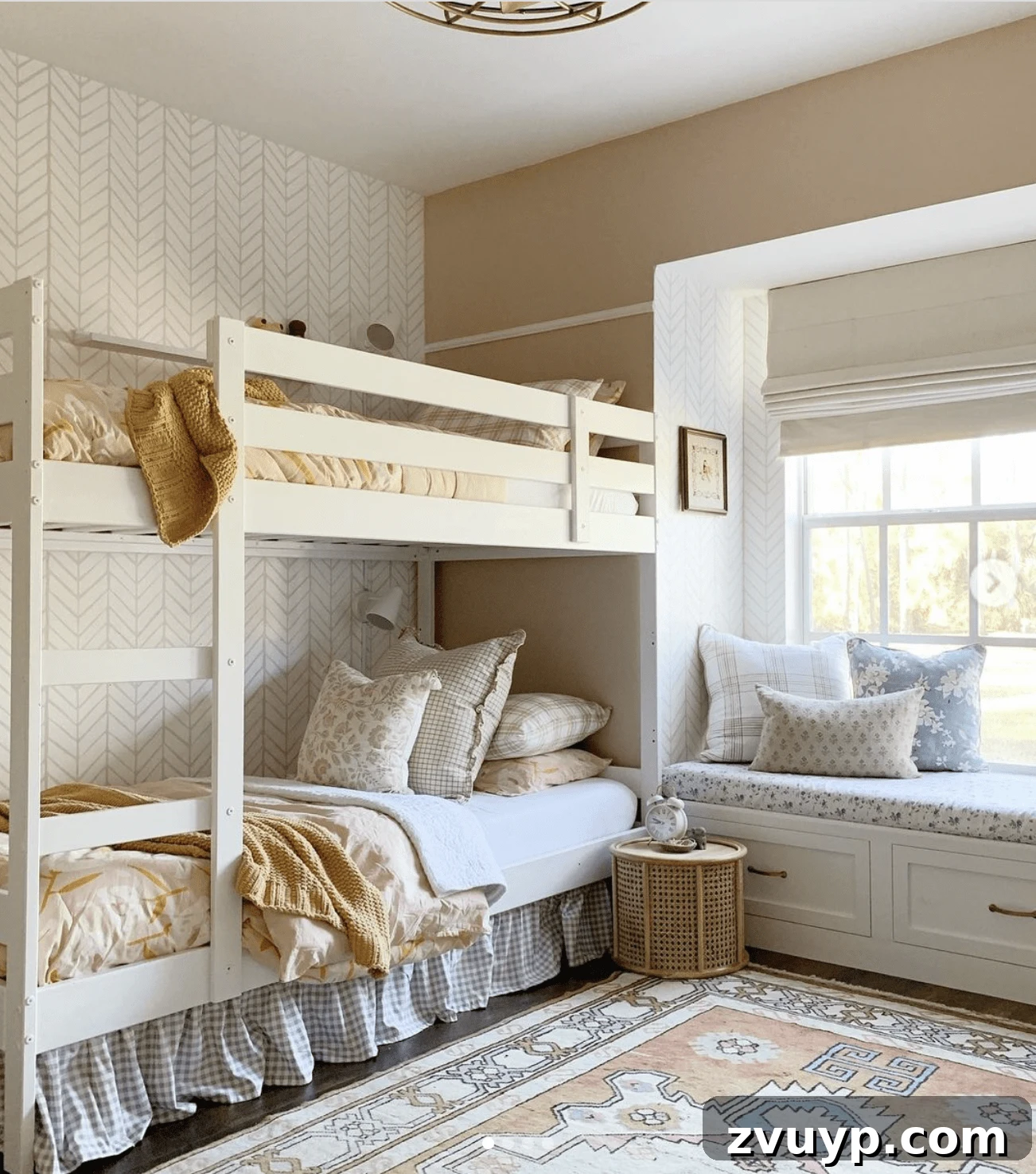Smart Bunk Beds to Maximize Small Bedrooms 11 Blush pink shared bedroom for girls, showcasing eclectic bedding with mixed patterns and textures for a charming and personalized look.